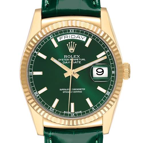 The image shows a frontal view of the Rolex President model, highlighting the green dial, gold bezel, and day-date feature.