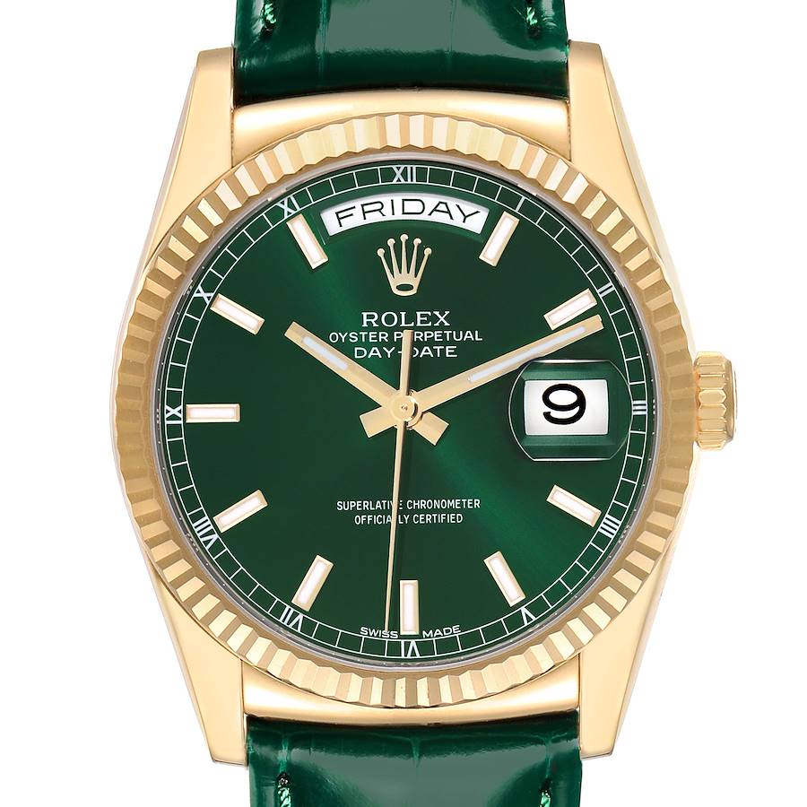 The Rolex President model is shown from the front, highlighting the green dial, gold case, and day-date display.