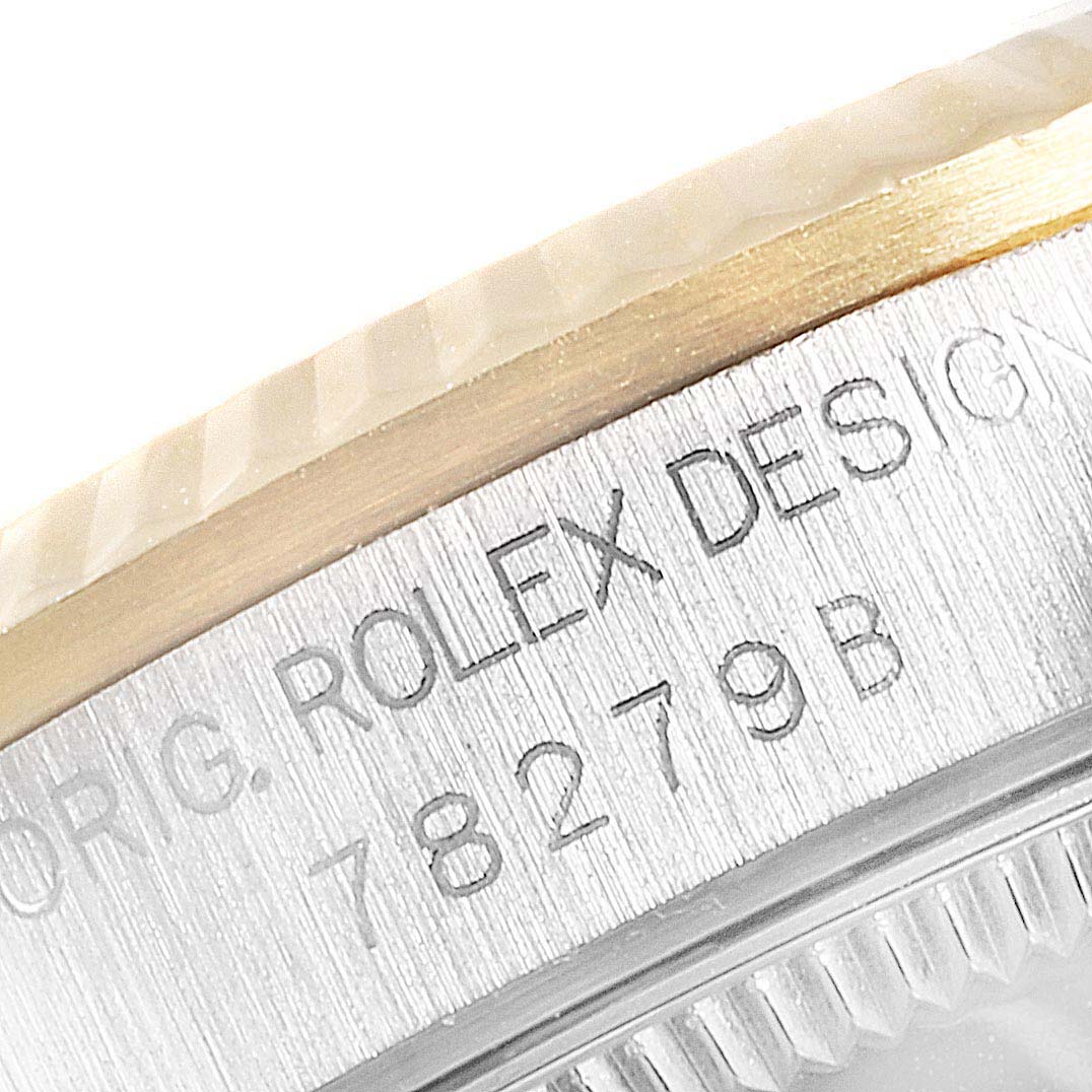 The image shows a close-up of the case side with engravings of the Rolex President 78279 Women
s White Gold Brown Dial 78279 Women
s White Gold Brown Dial model watch.