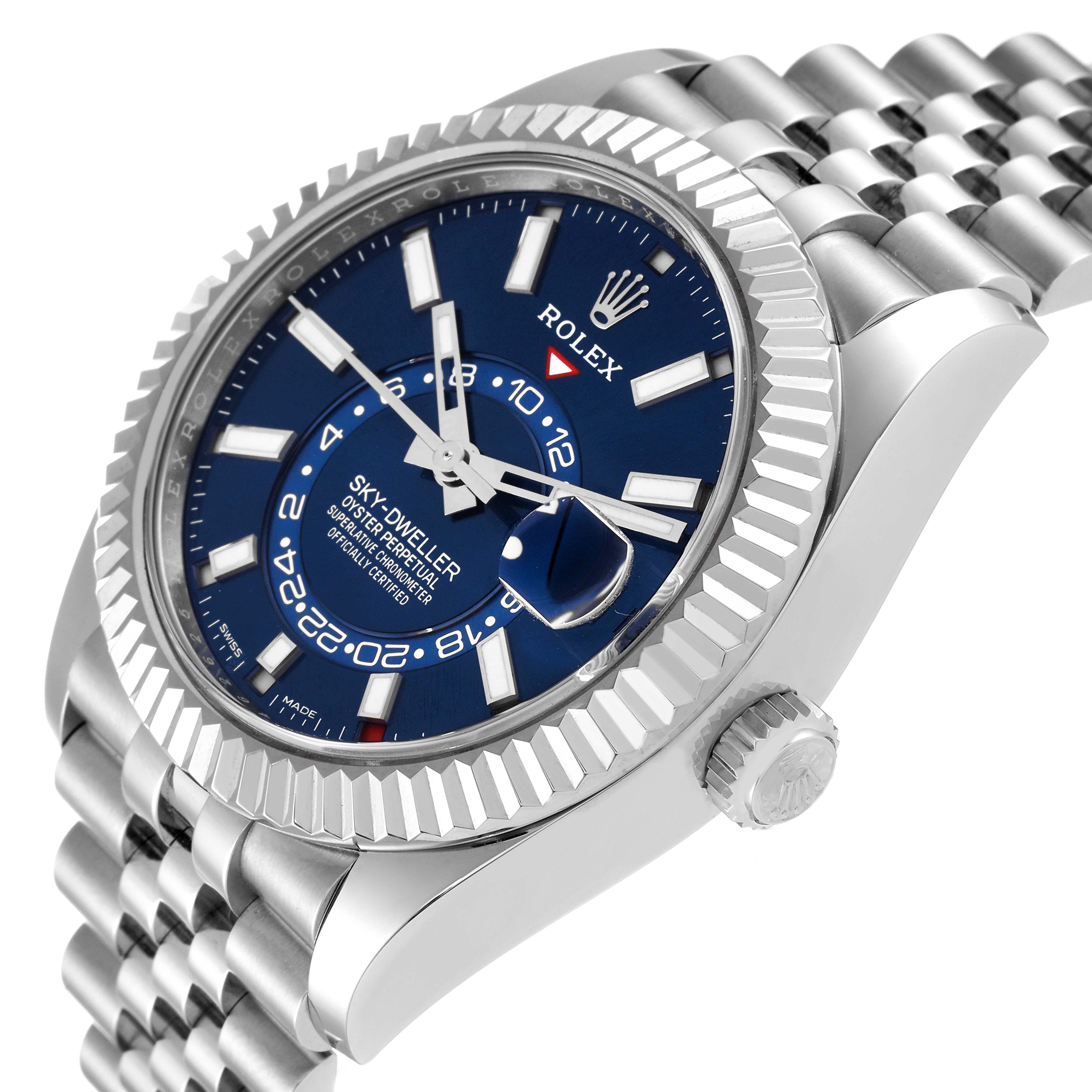 The image shows a Rolex Sky-Dweller 326934 Men
s Stainless Steel Blue Dial 326934 Men
s Stainless Steel Blue Dial watch at an oblique angle, highlighting its blue dial, fluted bezel, and part of the bracelet.