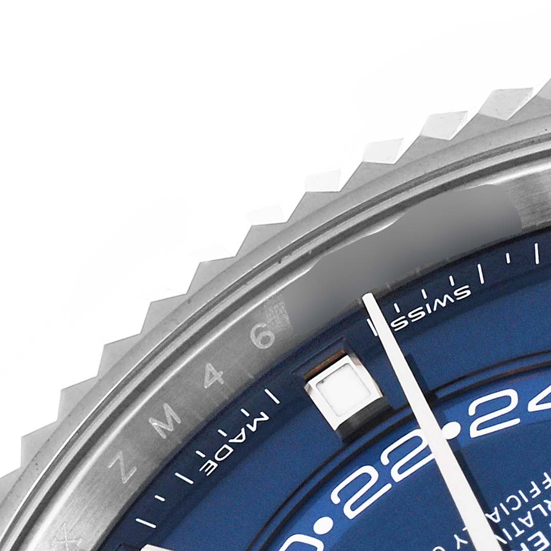 The image shows a close-up of the dial and bezel of a Rolex Sky-Dweller 326934 Men
s Stainless Steel Blue Dial 326934 Men
s Stainless Steel Blue Dial watch.