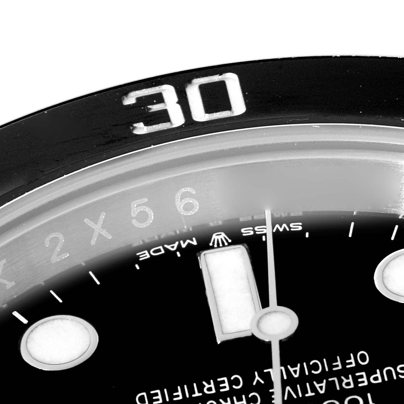 This image shows the dial and bezel of a Rolex Submariner 126610 Men
s Stainless Steel Black Dial 126610 Men
s Stainless Steel Black Dial watch at an angle highlighting the "30" marking and part of the minute hand.