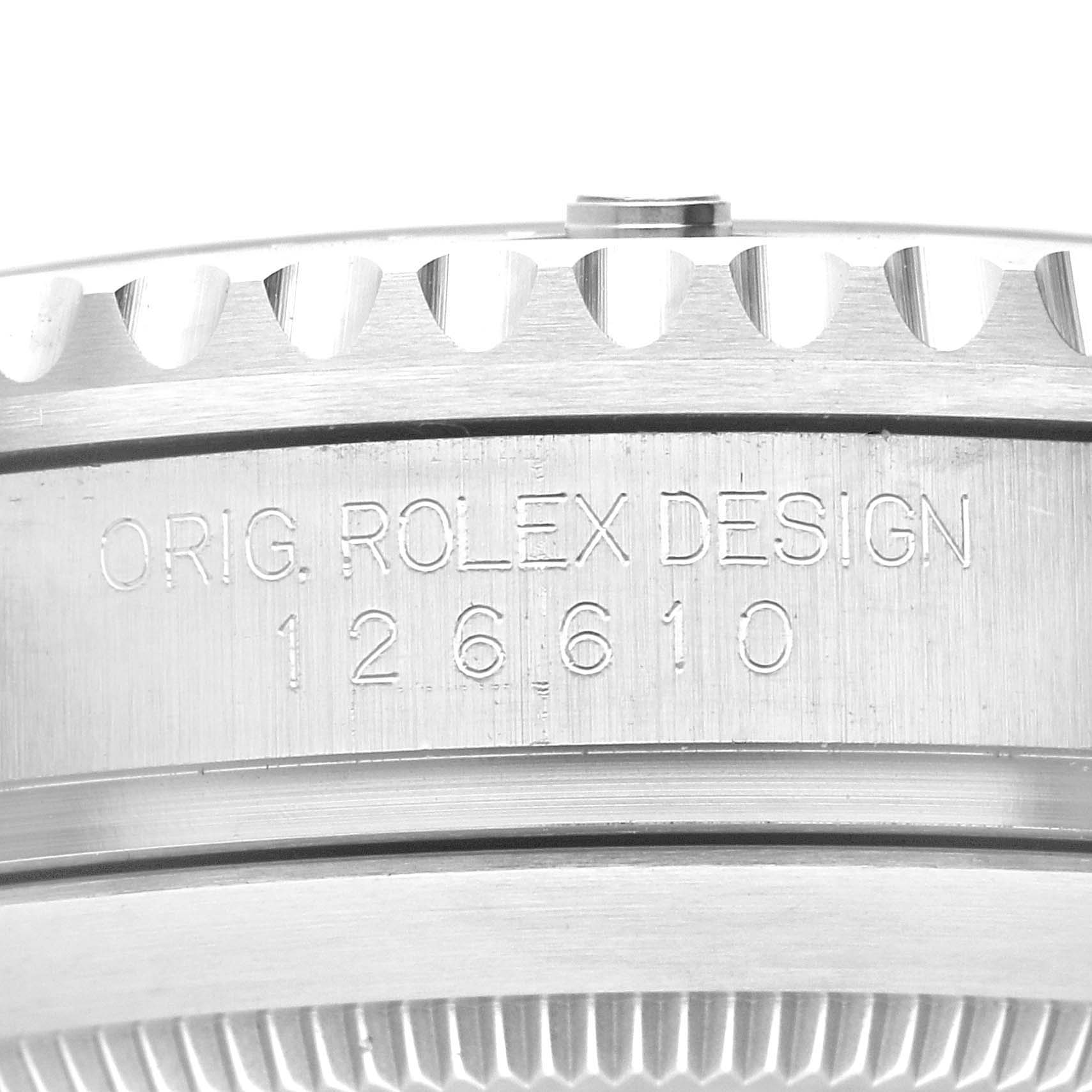 The image shows a close-up of the side engraving on a Rolex Submariner 126610 Men
s Stainless Steel Black Dial 126610 Men
s Stainless Steel Black Dial, detailing the "ORIG. ROLEX DESIGN" and model number "126610".