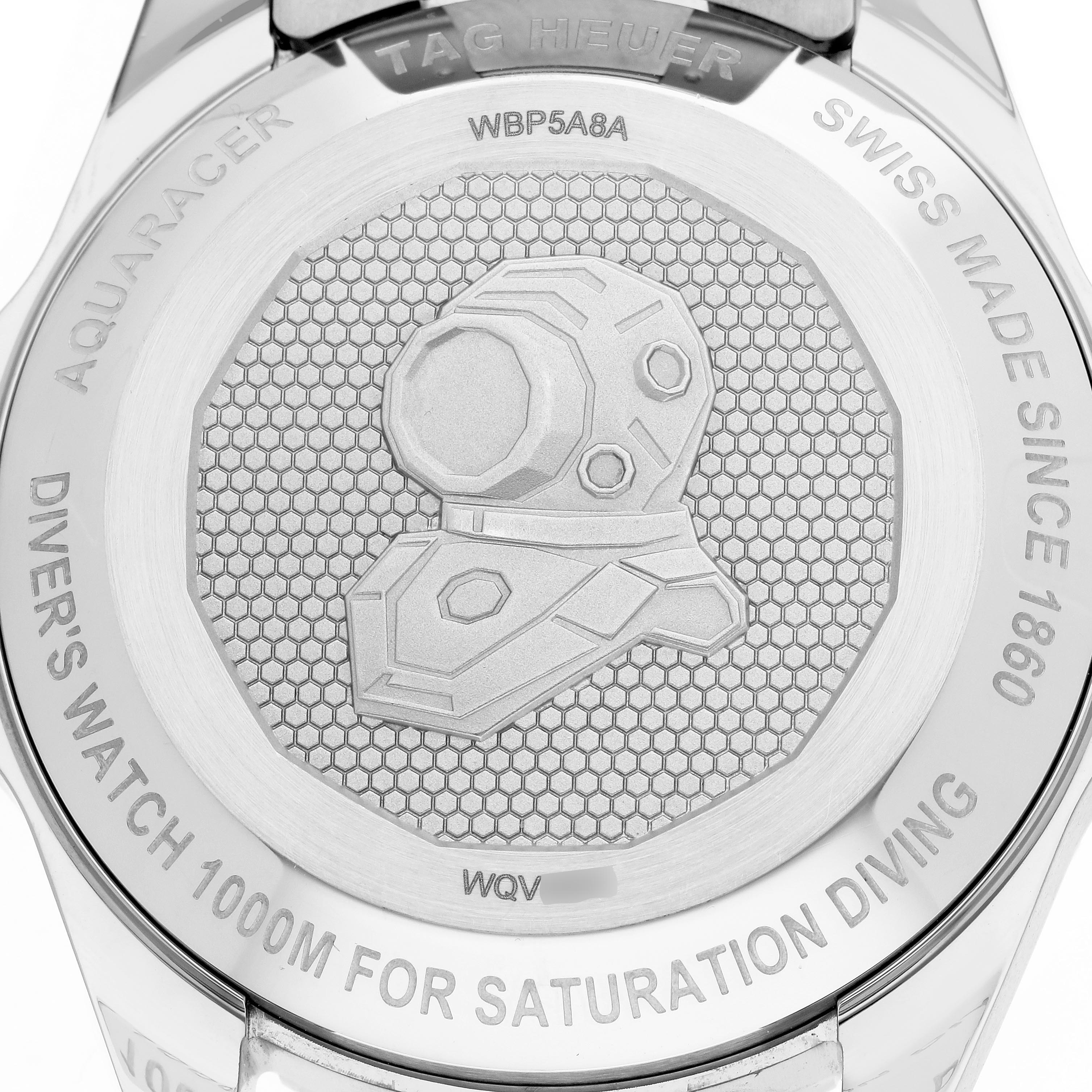 The image shows the case back of a Tag Heuer Aquaracer WBP5A8A Men
s Stainless Steel Black Dial WBP5A8A Men
s Stainless Steel Black Dial watch with engravings and a design.