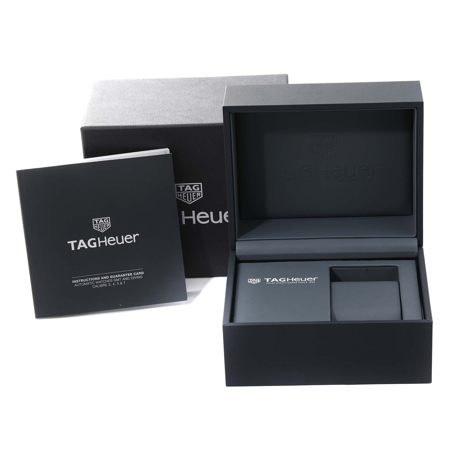 This image shows the packaging and instruction manual for the Aquaracer model by Tag Heuer, including the box and booklet.