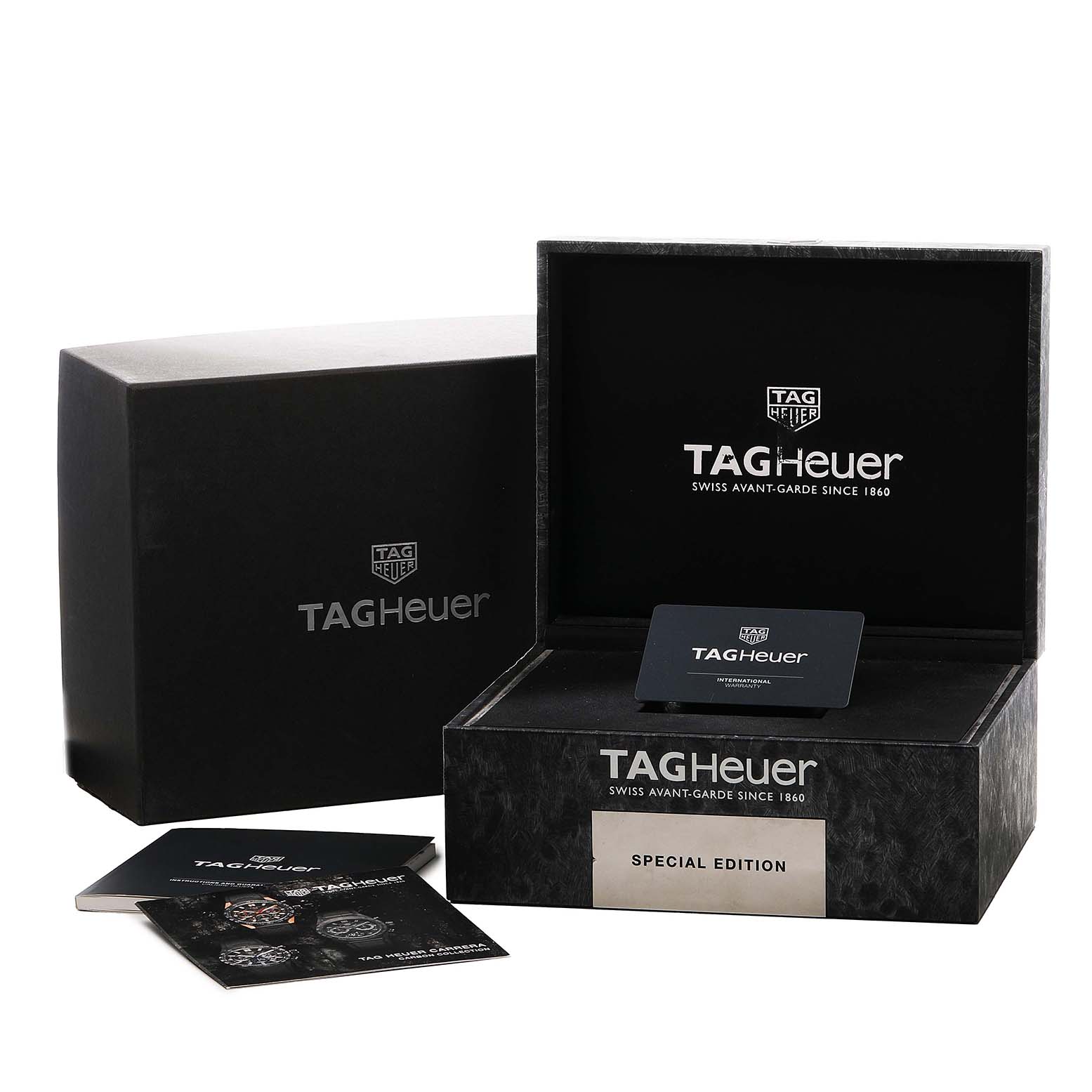 The image shows the box and accessories of the Tag Heuer Carrera CBG2052 Men's Steel and Gold (two tone) Black Dial, including the outer box, inner box, card, and booklets.