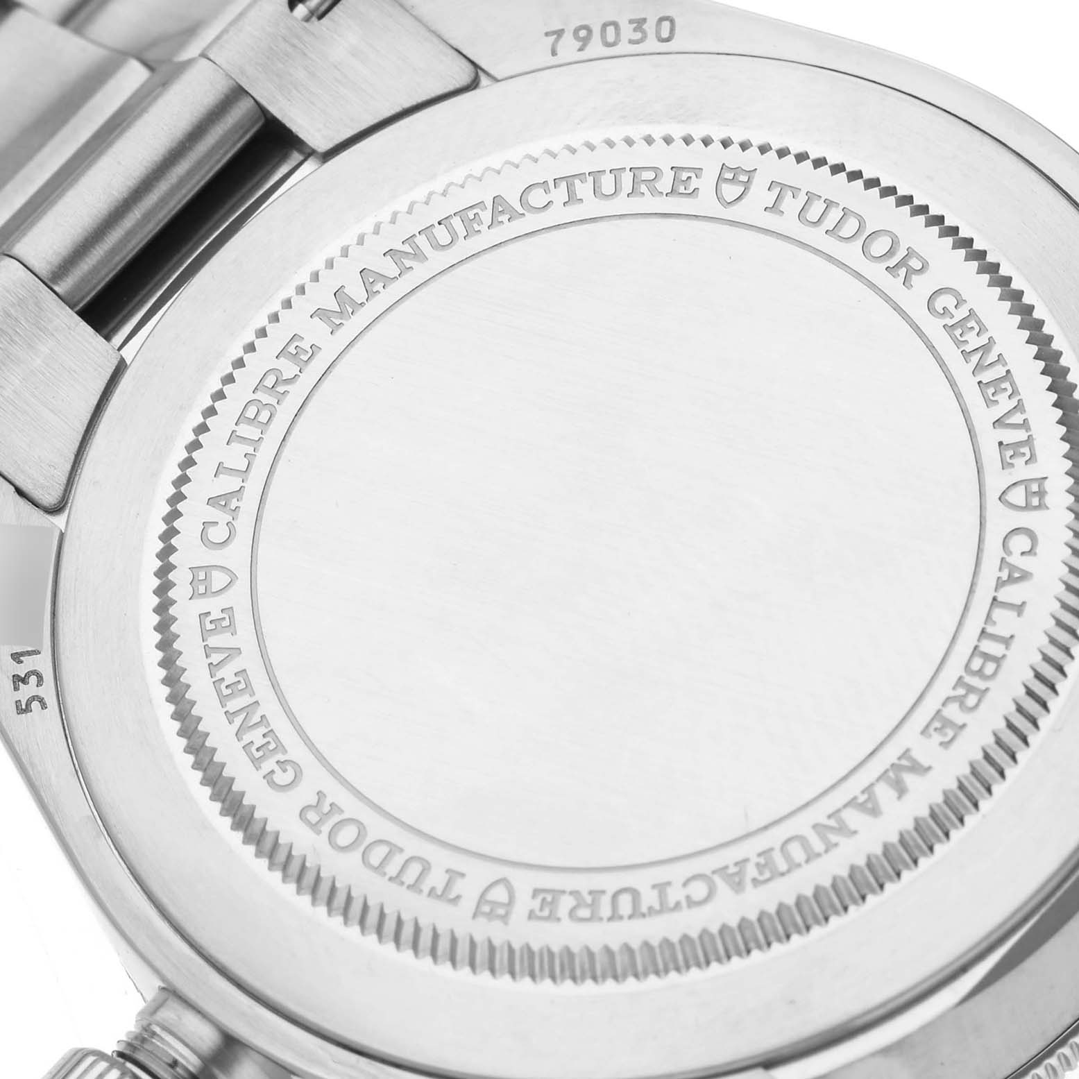 This image shows the back case of the Tudor Heritage Black Bay 79030N Men
s Stainless Steel Black Dial 79030N Men
s Stainless Steel Black Dial watch, highlighting the model number and branding.