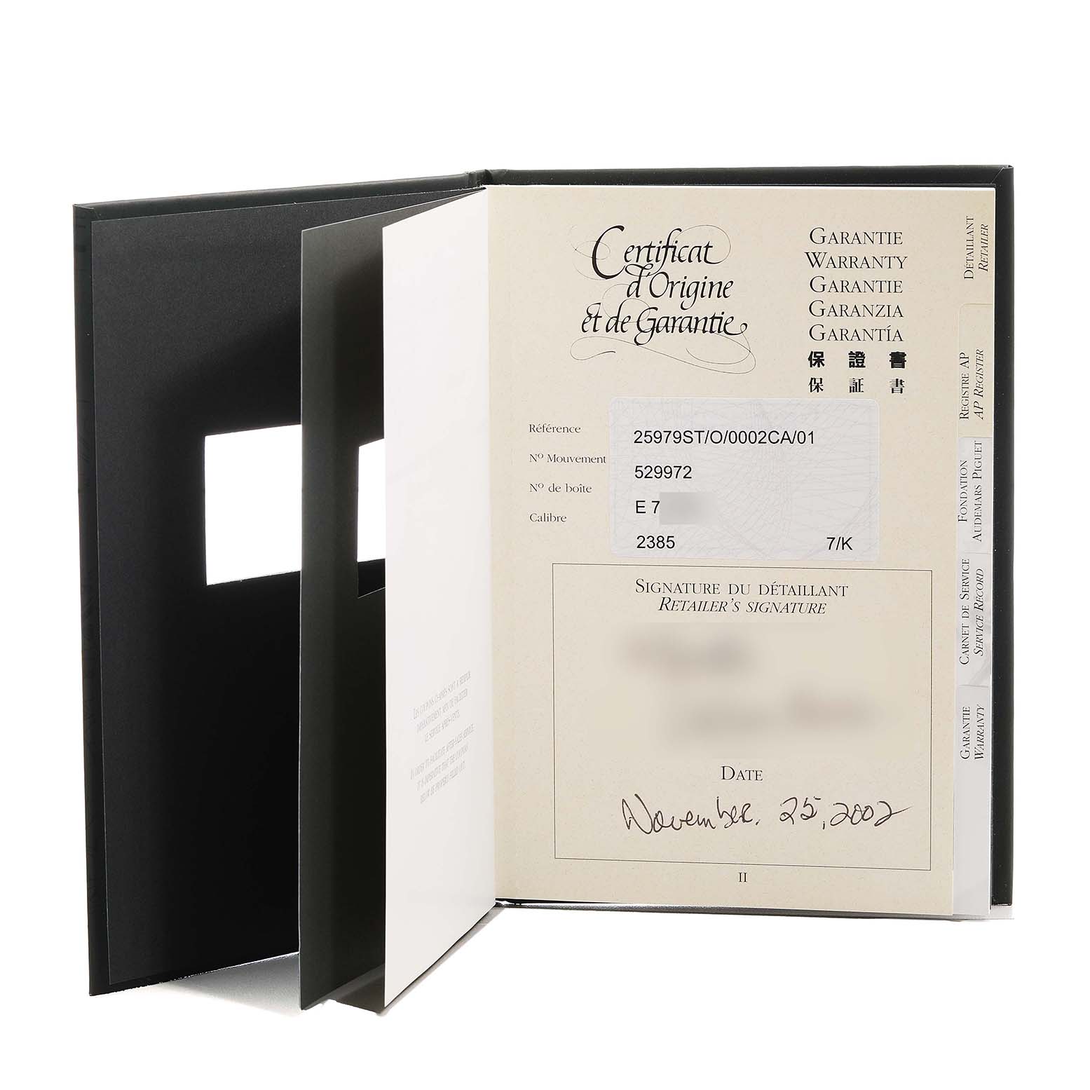 The image shows the warranty certificate booklet for the Royal Oak by Audemars Piguet, viewed partially open.