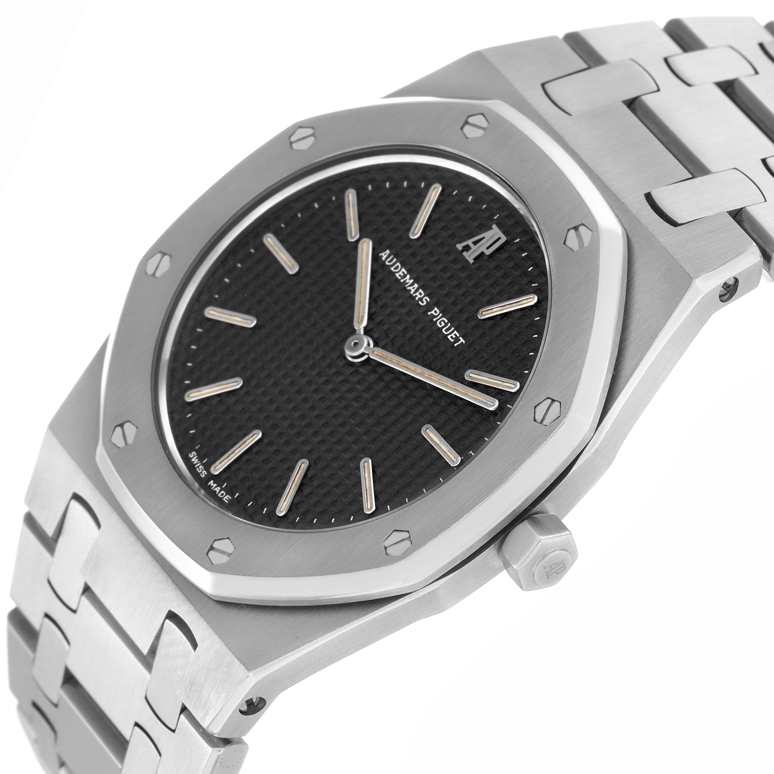 The image shows a side angle of the Audemars Piguet Royal Oak 56303ST.OO.789ST Men
s Stainless Steel Black Dial 56303ST.OO.789ST Men
s Stainless Steel Black Dial watch, highlighting its octagonal bezel, textured dial, and metal bracelet.