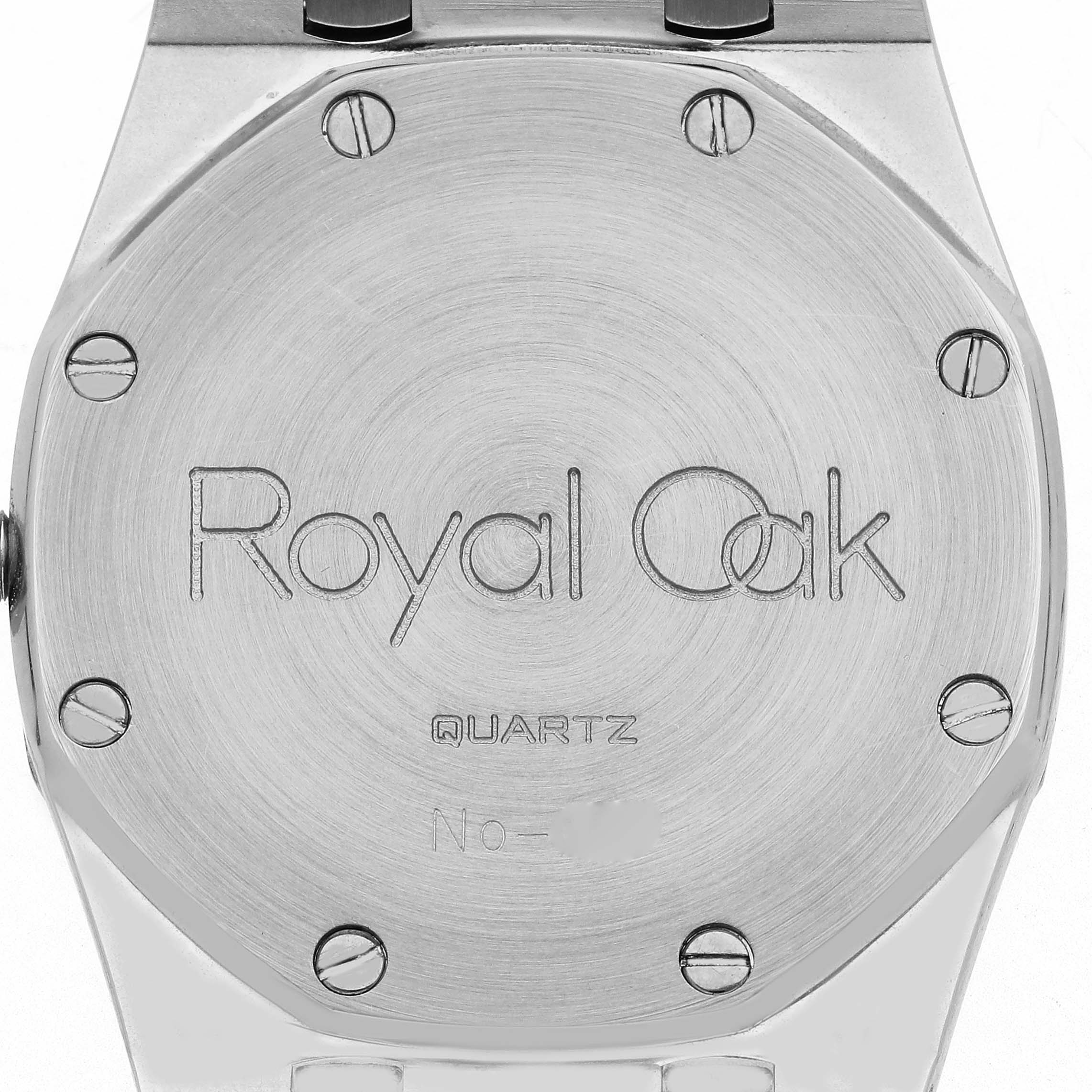 The image shows the back of an Audemars Piguet Royal Oak 56303ST.OO.789ST Men
s Stainless Steel Black Dial 56303ST.OO.789ST Men
s Stainless Steel Black Dial watch, featuring its engraved case back with visible screws.