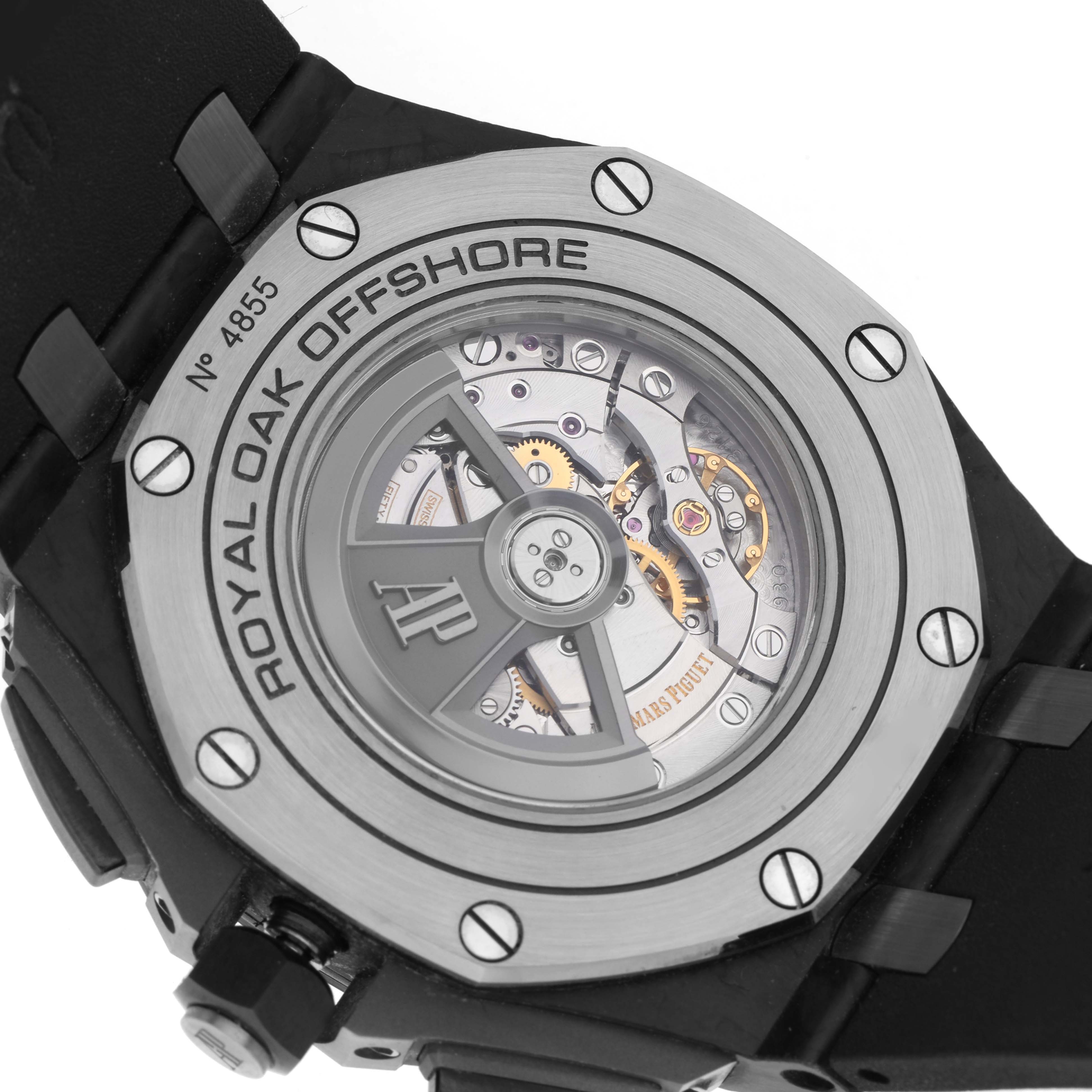 The image shows the case back of an Audemars Piguet Royal Oak Offshore 26400AU.OO.A002CA.01 Men's Ceramic Black Dial 26400AU.OO.A002CA.01 Men's Ceramic Black Dial, highlighting the movement and transparent back.
