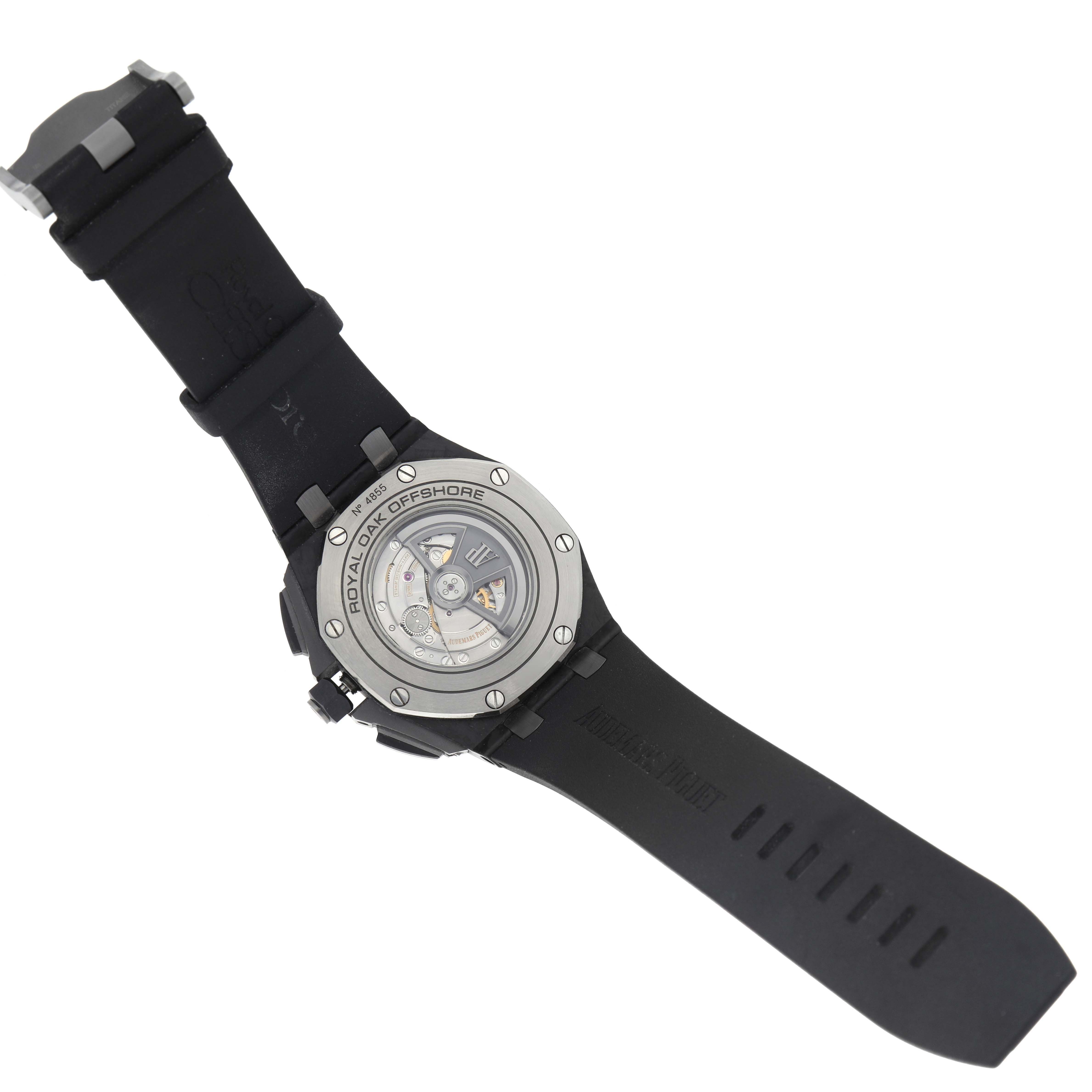 The image shows the back of the Audemars Piguet Royal Oak Offshore 26400AU.OO.A002CA.01 Men's Ceramic Black Dial 26400AU.OO.A002CA.01 Men's Ceramic Black Dial watch, highlighting the transparent case back and movement.