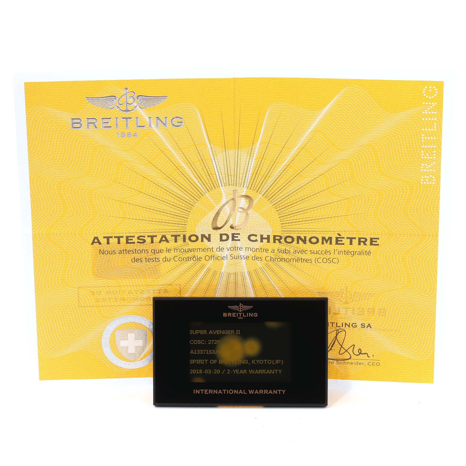 The image shows a Breitling Avenger A13371 Men's Stainless Steel Black Dial A13371 Men's Stainless Steel Black Dial model certificate and an international warranty card.