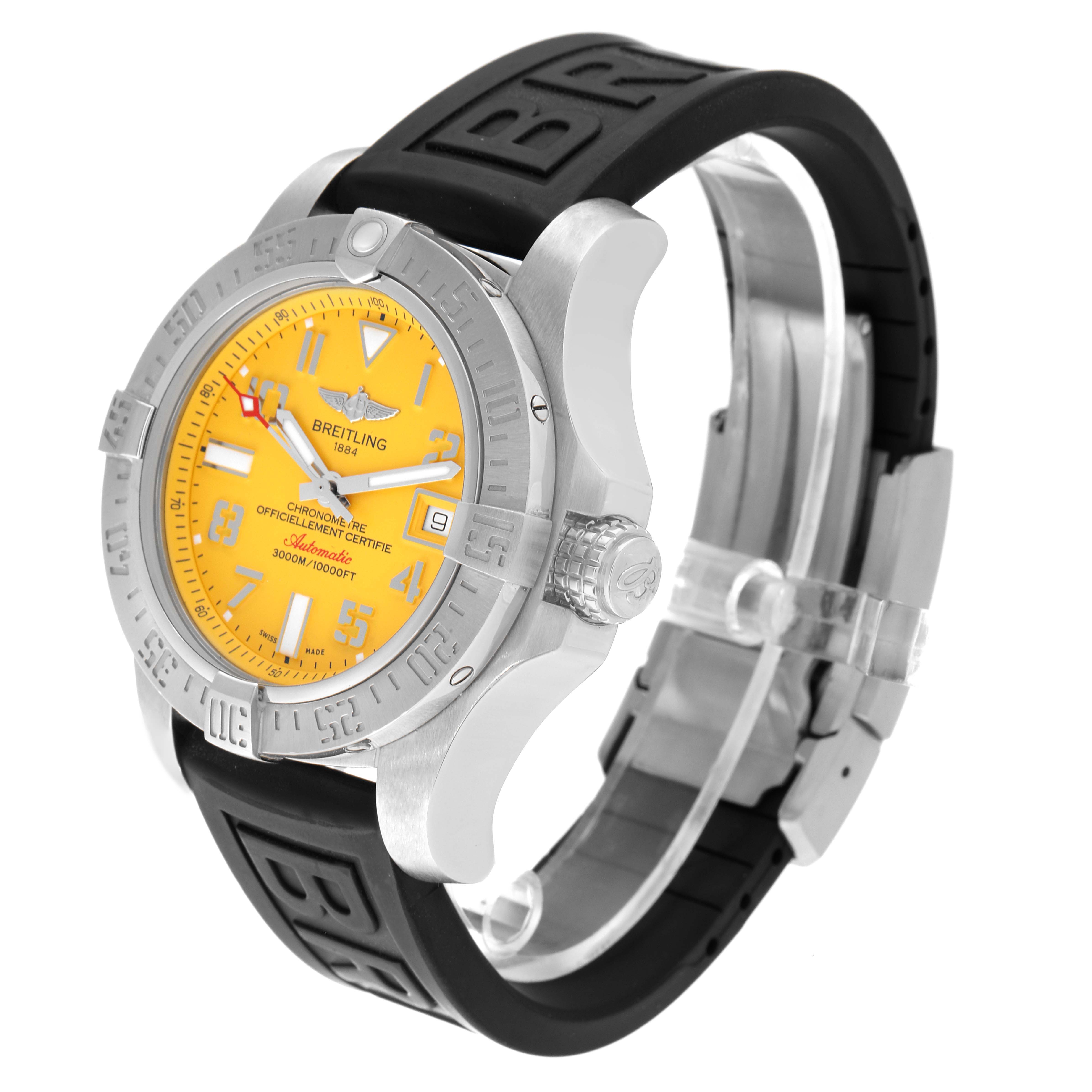 The image shows a Breitling Avenger A17331 Men's Stainless Steel Yellow Dial A17331 Men's Stainless Steel Yellow Dial watch angled from the top right, displaying its face, bezel, crown, and rubber strap.