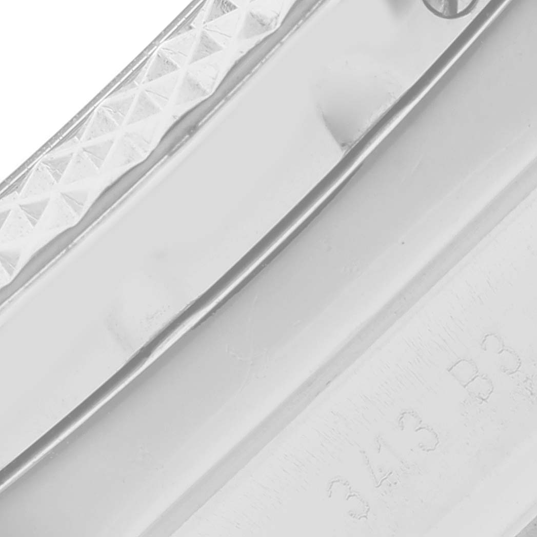 This close-up image shows part of the bezel and an engraving on the Bentley model by Breitling watch.