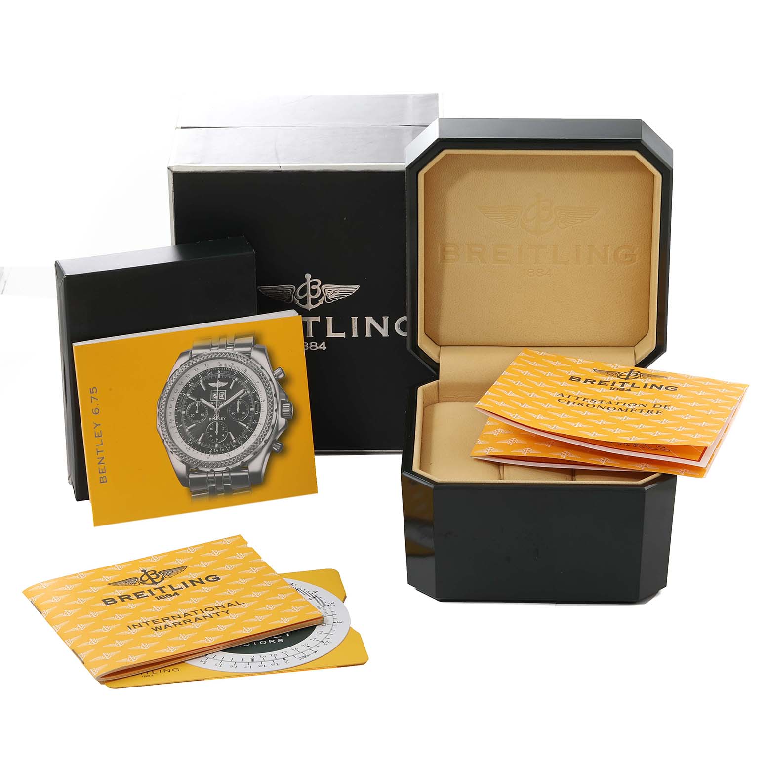 The image shows the box and accessories, including manuals, for the Bentley model by Breitling, but not the watch itself.