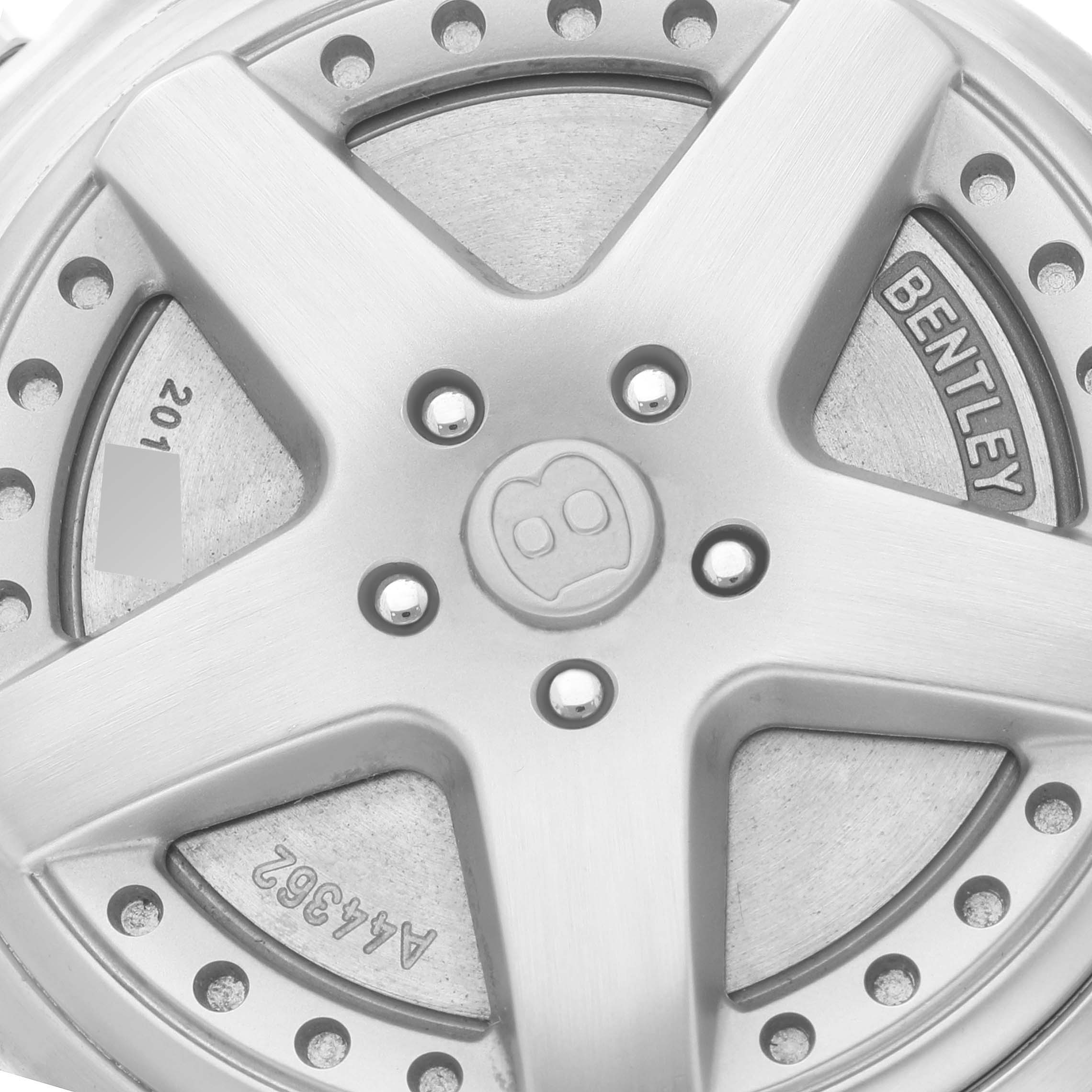 A close-up of the Bentley model by Breitling showing the wheel-like design with the Bentley logo and inscription.