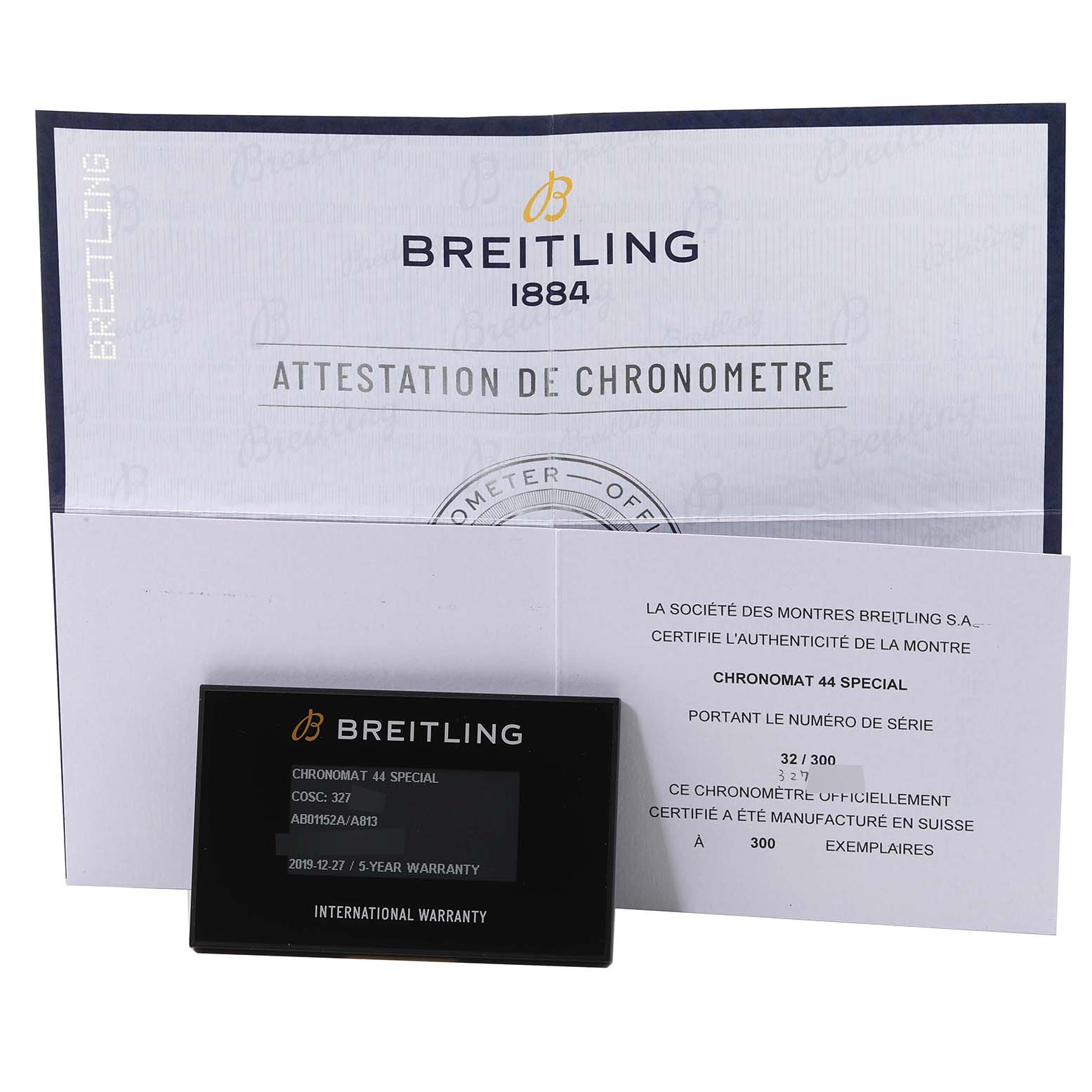 The image shows warranty cards and documentation for the Breitling Chronomat AB0115 Men's Stainless Steel Mother of Pearl Dial AB0115 Men's Stainless Steel Mother of Pearl Dial 44 Special, including a certificate and warranty card.