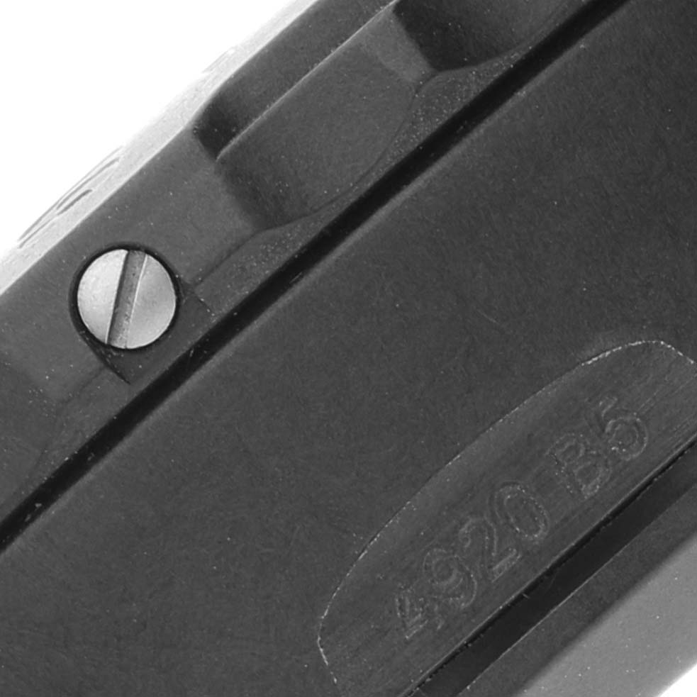 The image shows a close-up of the side casing and part of the bezel of a Breitling Professional Series X82310 Men's Ceramic Black Dial X82310 Men's Ceramic Black Dial watch.