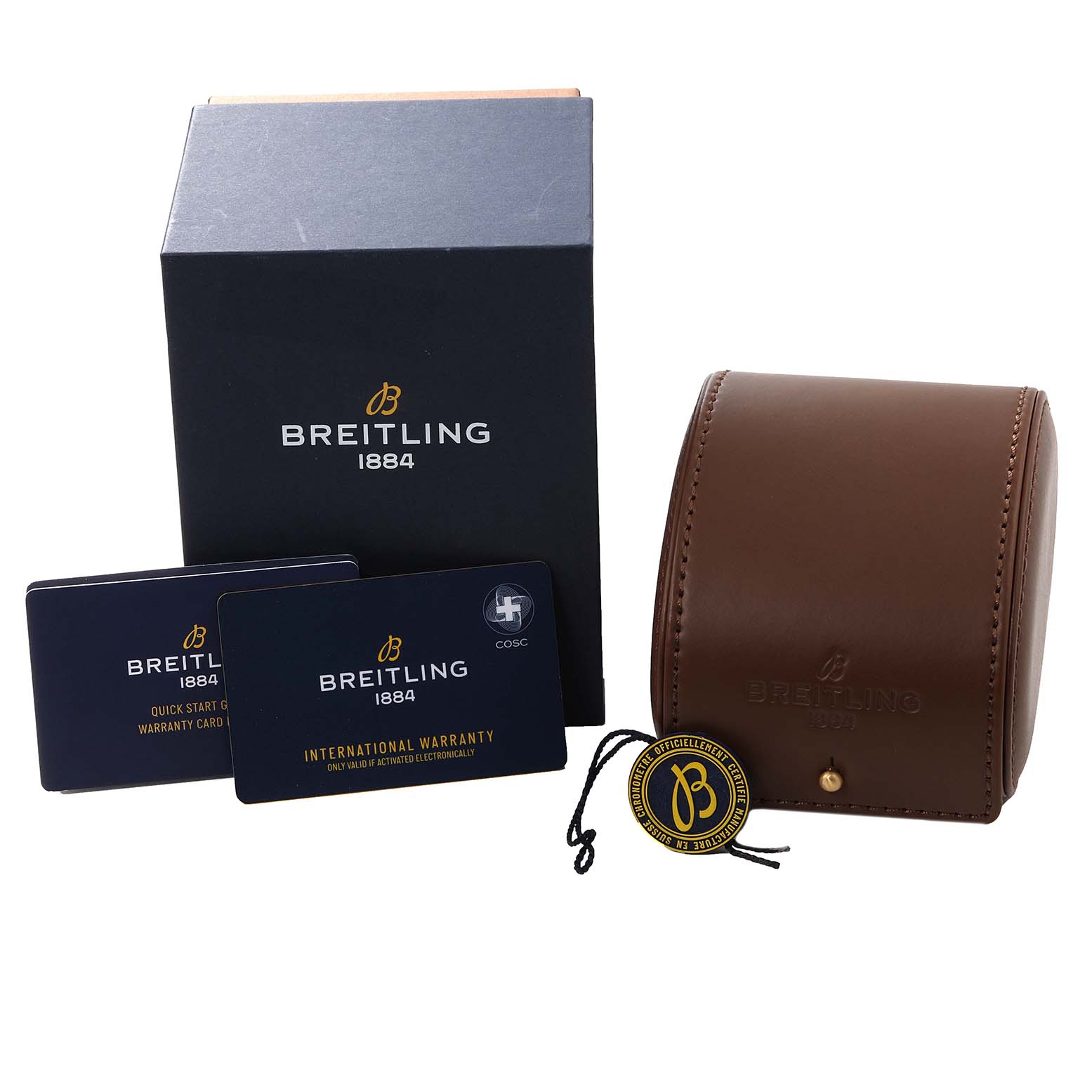 This image shows the packaging, warranty cards, and carrying case for a Breitling Professional Series X82310 Men's Ceramic Black Dial X82310 Men's Ceramic Black Dial watch.