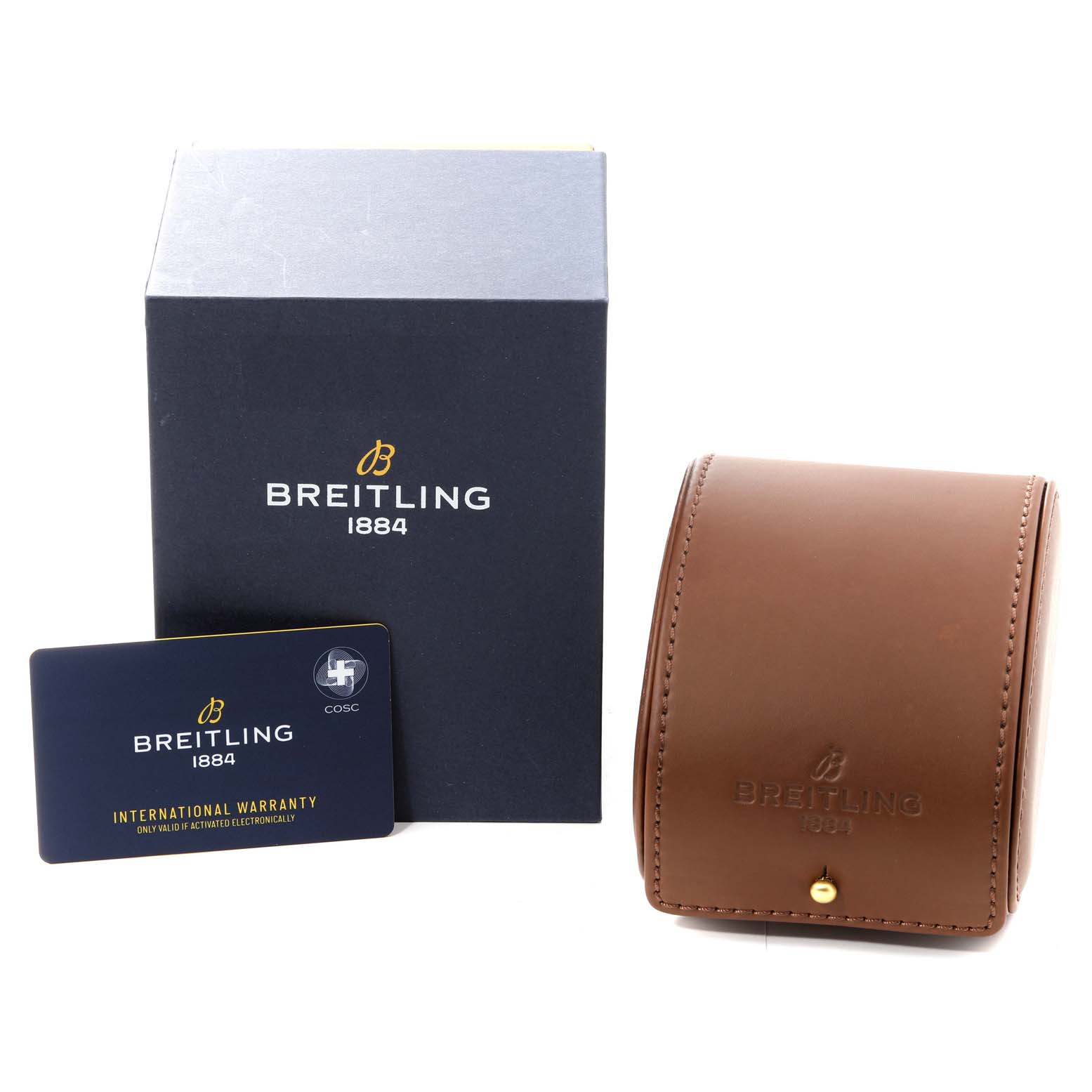 This image shows the packaging, warranty card, and a brown leather case for a Breitling Navitimer U13324 Men
s Stainless Steel Black Dial U13324 Men
s Stainless Steel Black Dial watch.