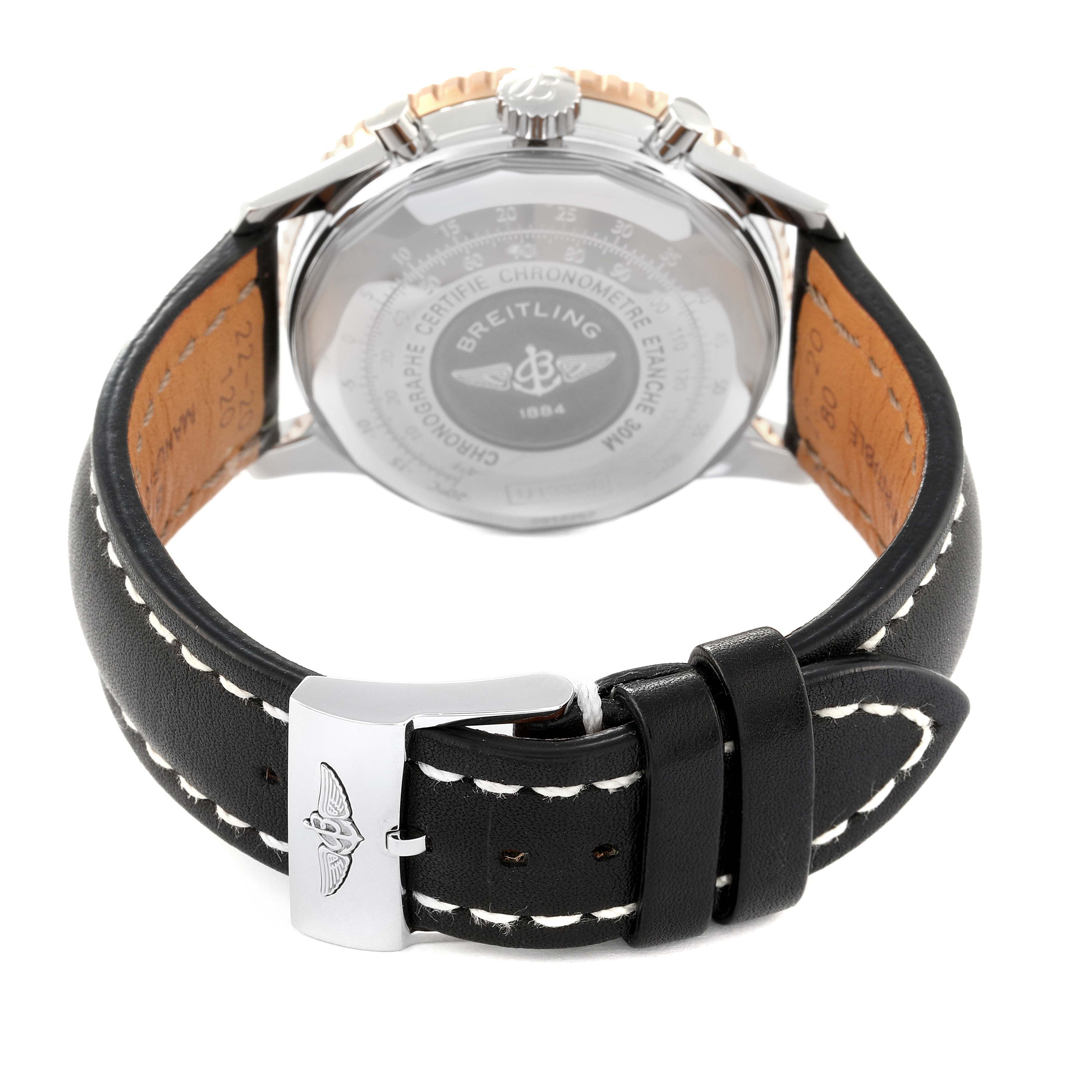 This image shows the back view of a Breitling Navitimer U13324 Men
s Stainless Steel Black Dial U13324 Men
s Stainless Steel Black Dial watch, highlighting the case back and black leather strap with white stitching.