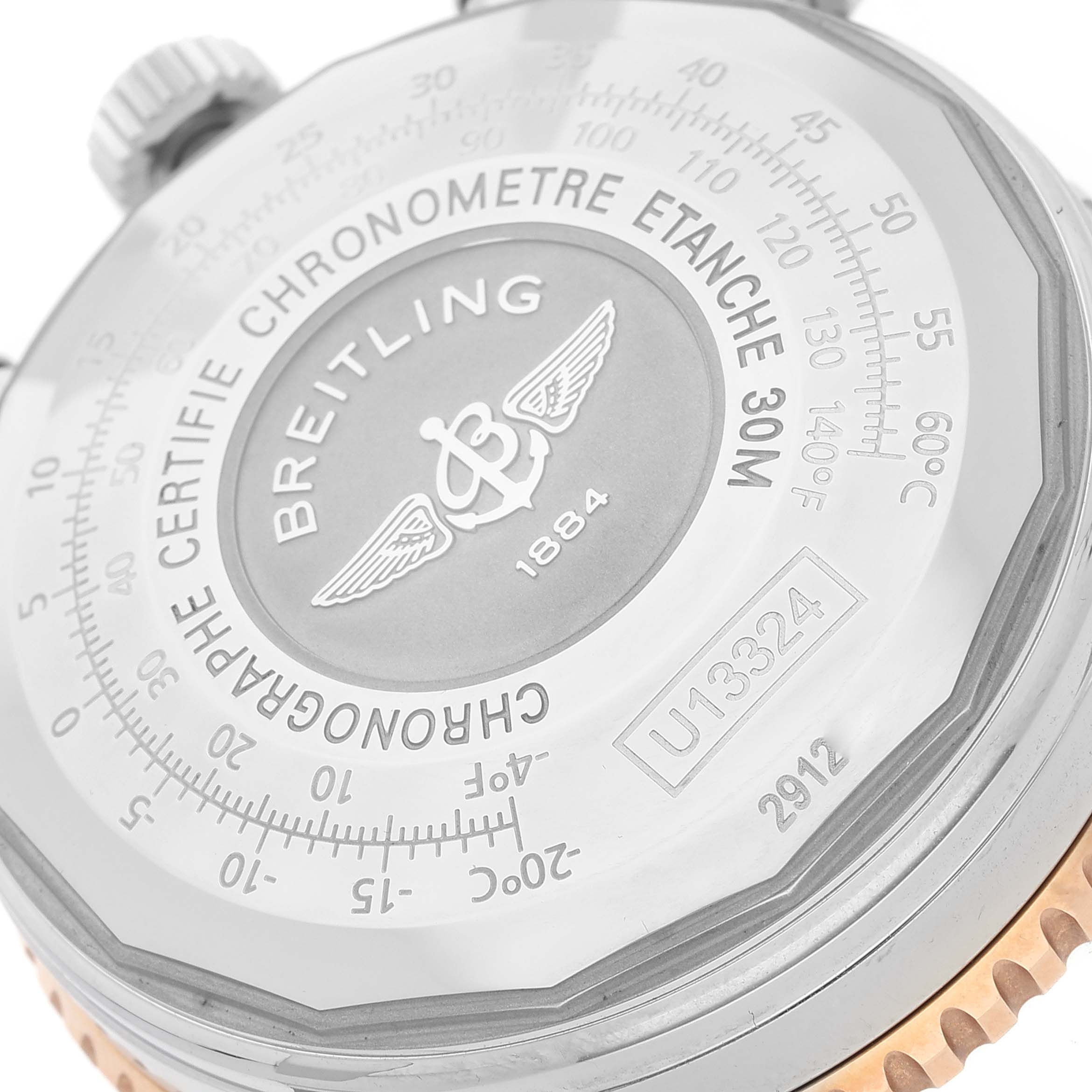 The image shows the back case of a Breitling Navitimer U13324 Men
s Stainless Steel Black Dial U13324 Men
s Stainless Steel Black Dial watch, highlighting the brand logo, model number, and specifications.