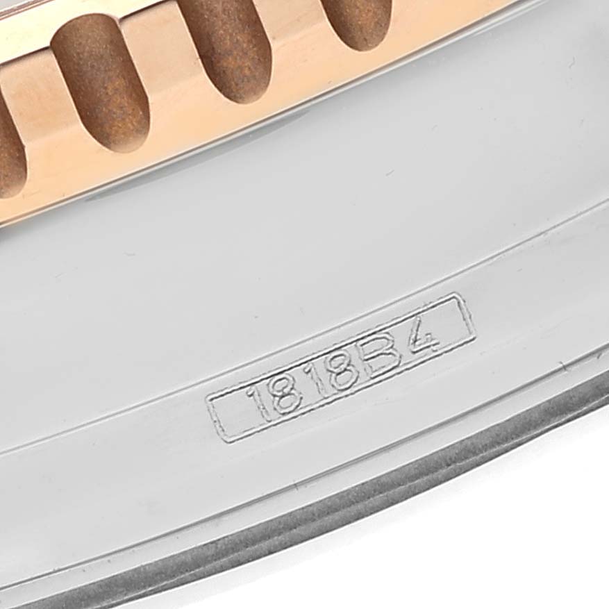 The image shows a close-up of the outer edge and model number "1818 B4" of a Breitling Navitimer U13324 Men
s Stainless Steel Black Dial U13324 Men
s Stainless Steel Black Dial watch.