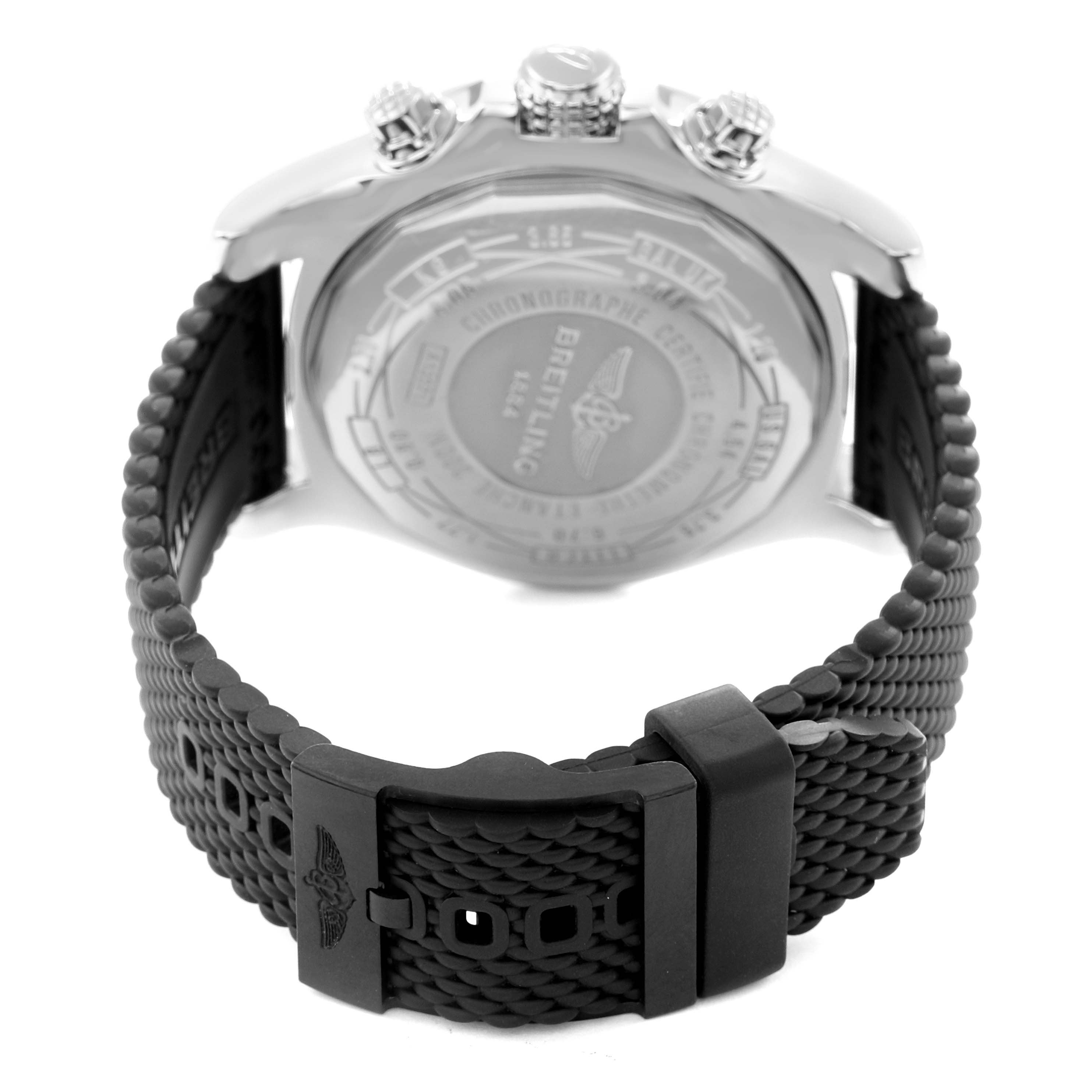 The Breitling Avenger A13371 Men
s Stainless Steel Black Dial A13371 Men
s Stainless Steel Black Dial watch is shown from the back, highlighting the case back, crown, pushers, and textured black strap.