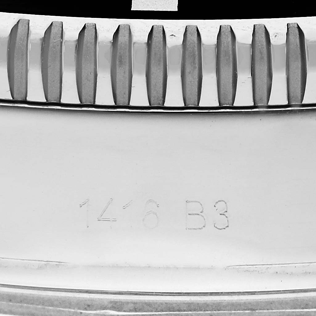 The image shows a close-up view of the bezel and engraved serial number of a Breitling Superocean A13320 Men's Stainless Steel Black Dial A13320 Men's Stainless Steel Black Dial watch.