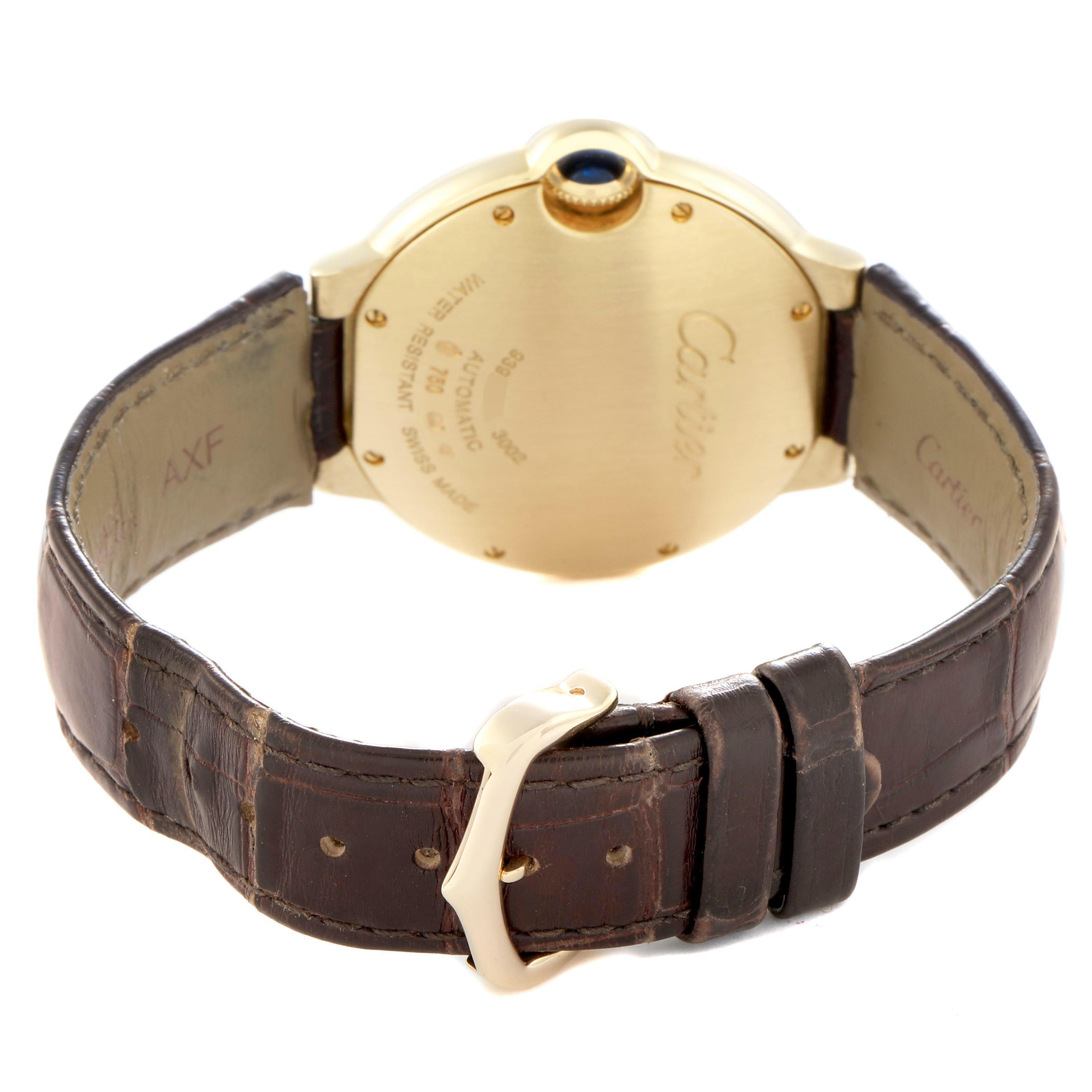 The image shows the back of a Cartier Ballon Bleu W6900356 Men
s Yellow Gold Silver Dial W6900356 Men
s Yellow Gold Silver Dial watch, highlighting the clasp, strap, and case back.