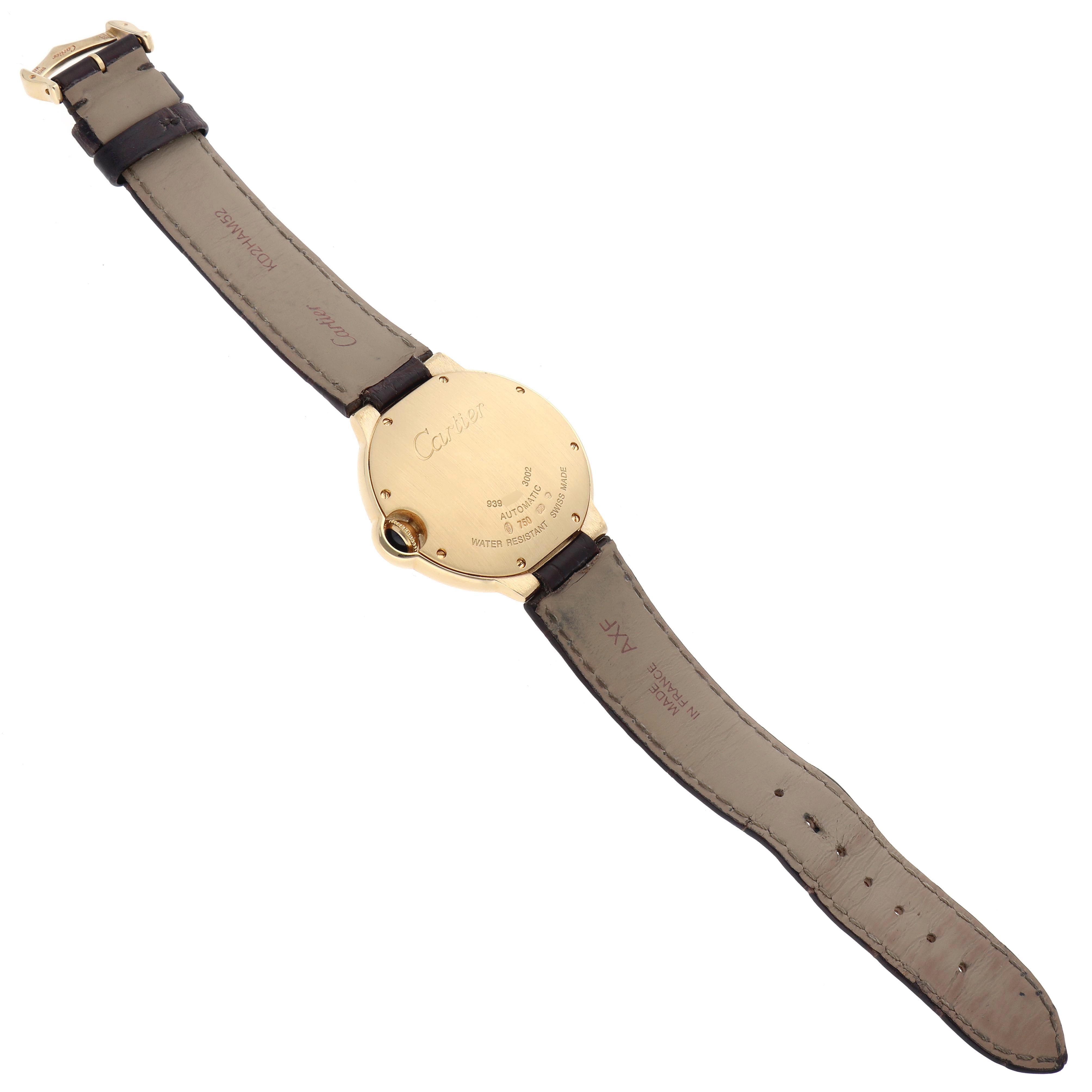 The image shows the back view of the Cartier Ballon Bleu W6900356 Men
s Yellow Gold Silver Dial W6900356 Men
s Yellow Gold Silver Dial watch, highlighting the case and leather strap.