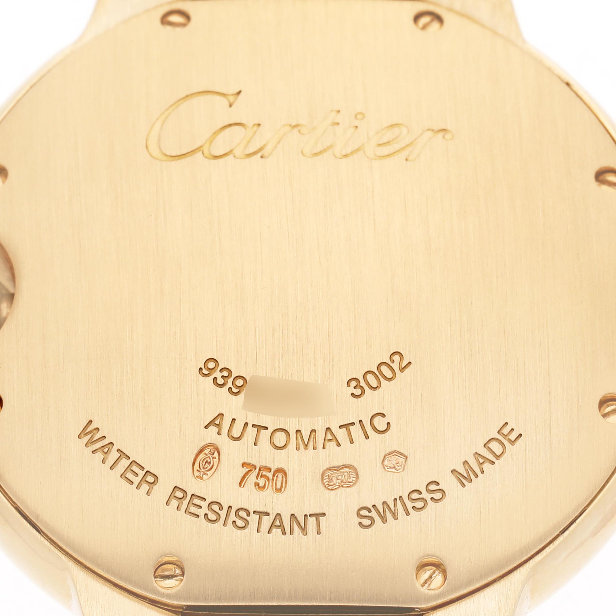 The image shows the back of a Cartier Ballon Bleu W6900356 Men
s Yellow Gold Silver Dial W6900356 Men
s Yellow Gold Silver Dial watch case, displaying inscriptions and details about its features.