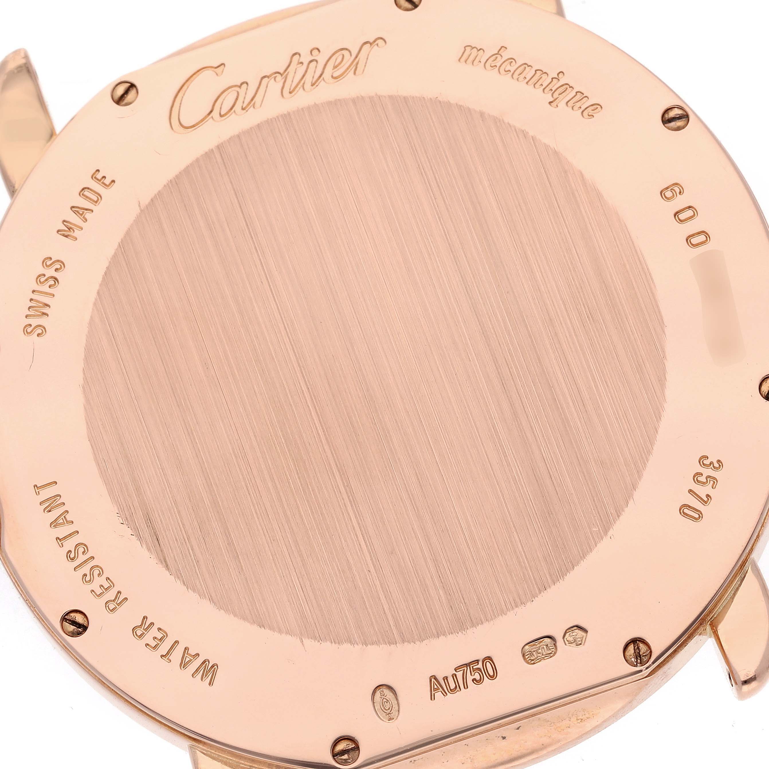 The image shows the back of a Cartier Ronde W6801004 Men
s Rose Gold Silver Dial W6801004 Men
s Rose Gold Silver Dial watch, highlighting its engravings and screw details.