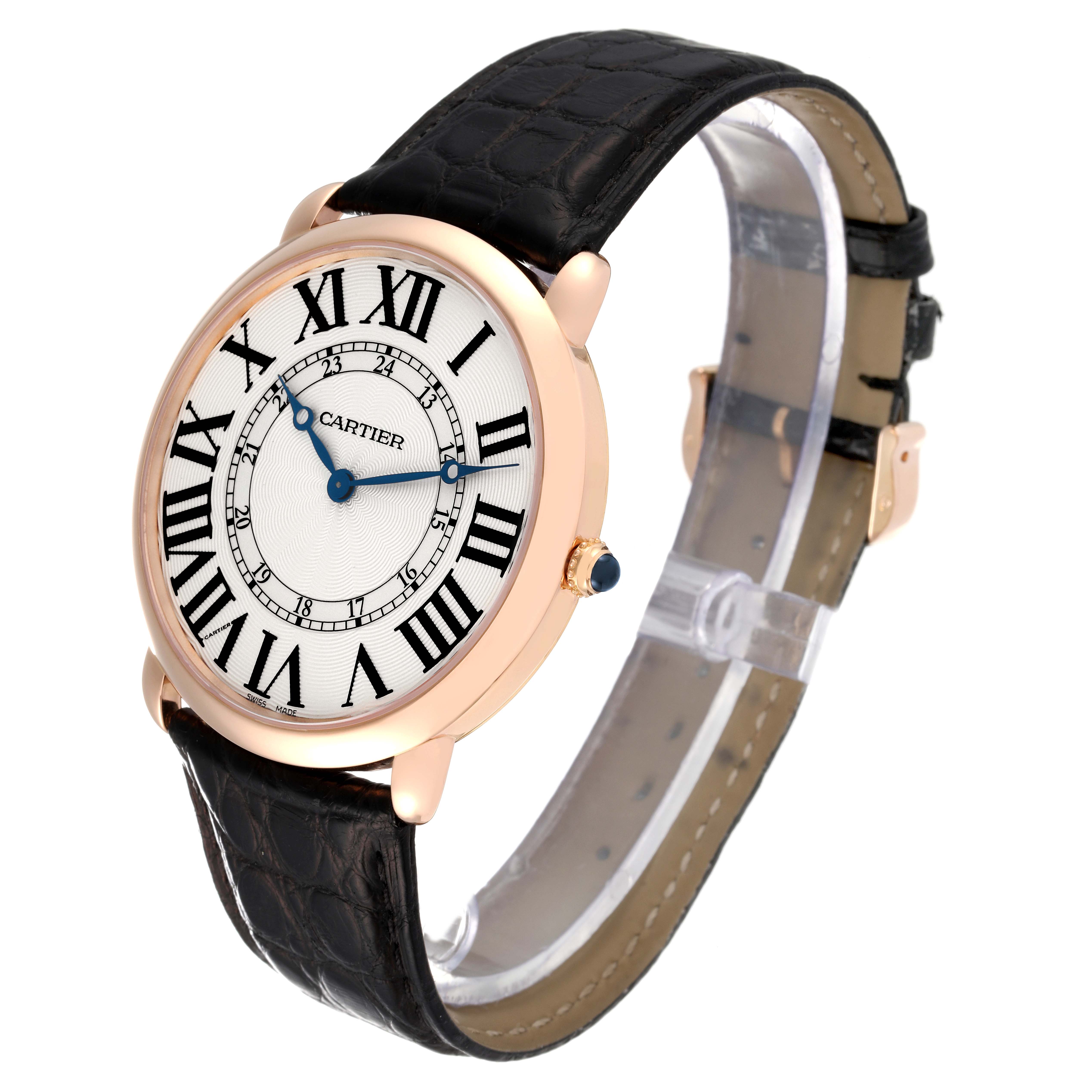 This image shows a Cartier Ronde W6801004 Men
s Rose Gold Silver Dial W6801004 Men
s Rose Gold Silver Dial model watch from an angled side view, highlighting the face, case, and leather strap.