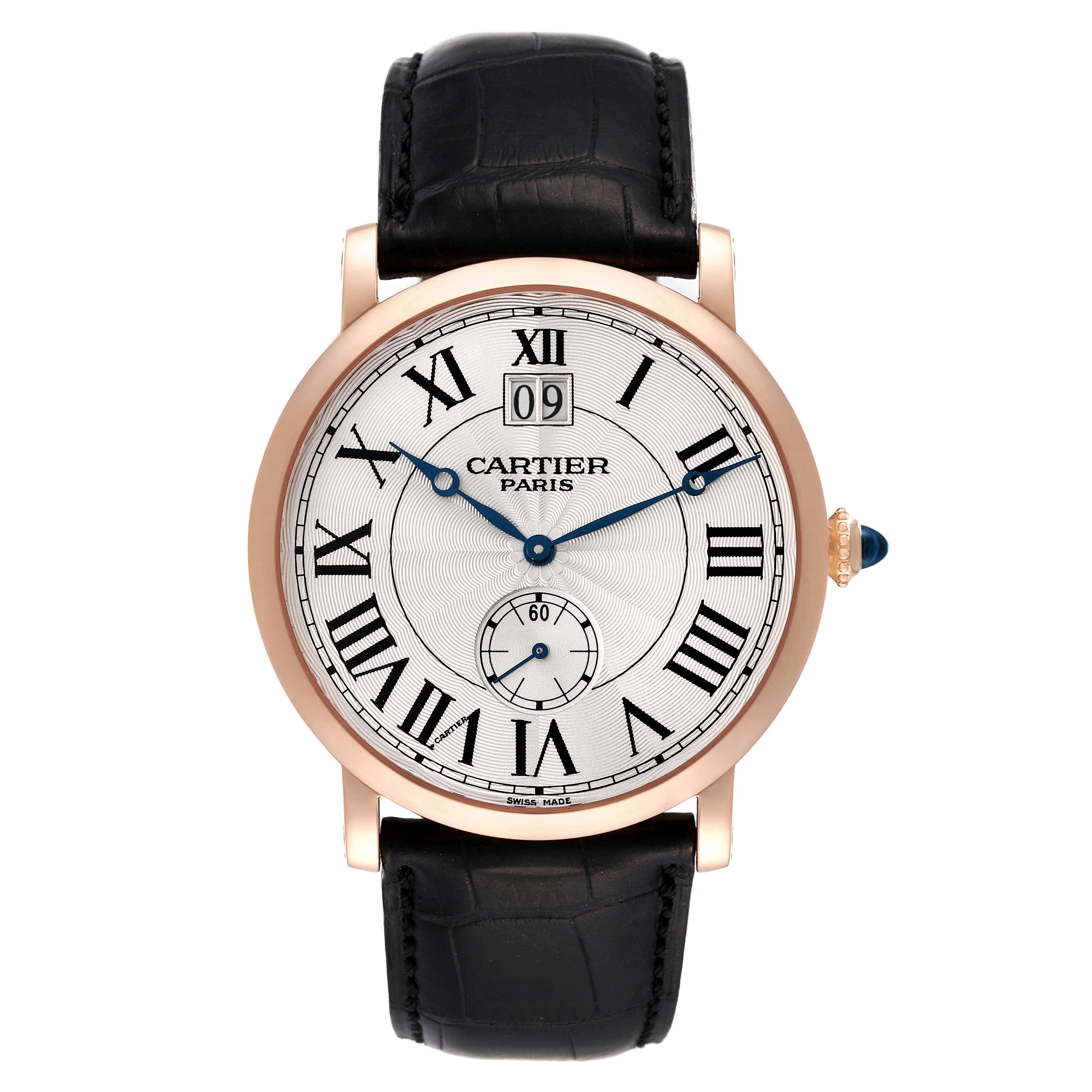 The image shows a front view of the Rotonde model by Cartier, highlighting the watch face, hands, Roman numerals, and leather strap.