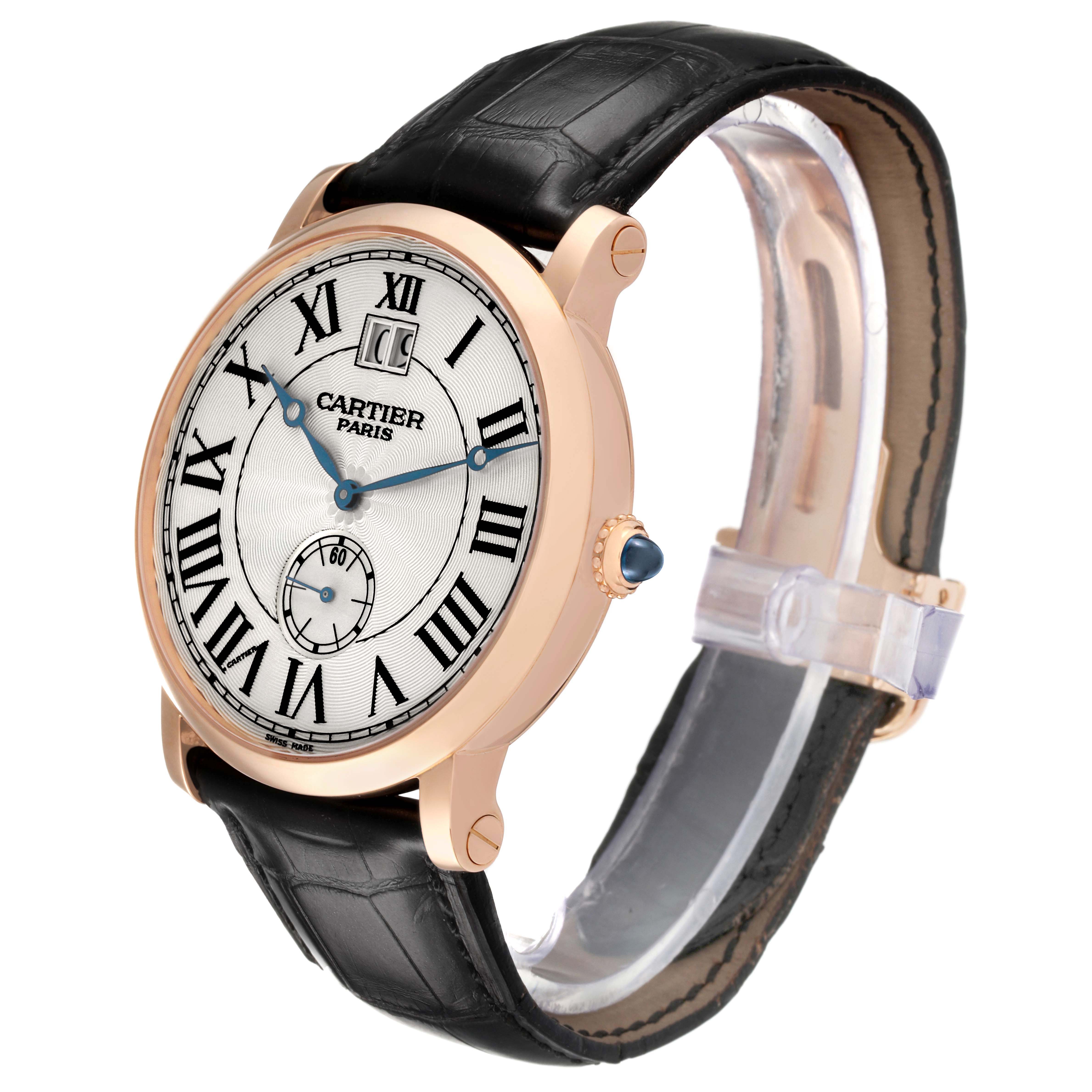 The Cartier Rotonde W1550251 Men's Rose Gold Silver Dial watch is shown from a slightly angled front view, highlighting the dial, case, crown, and leather strap.