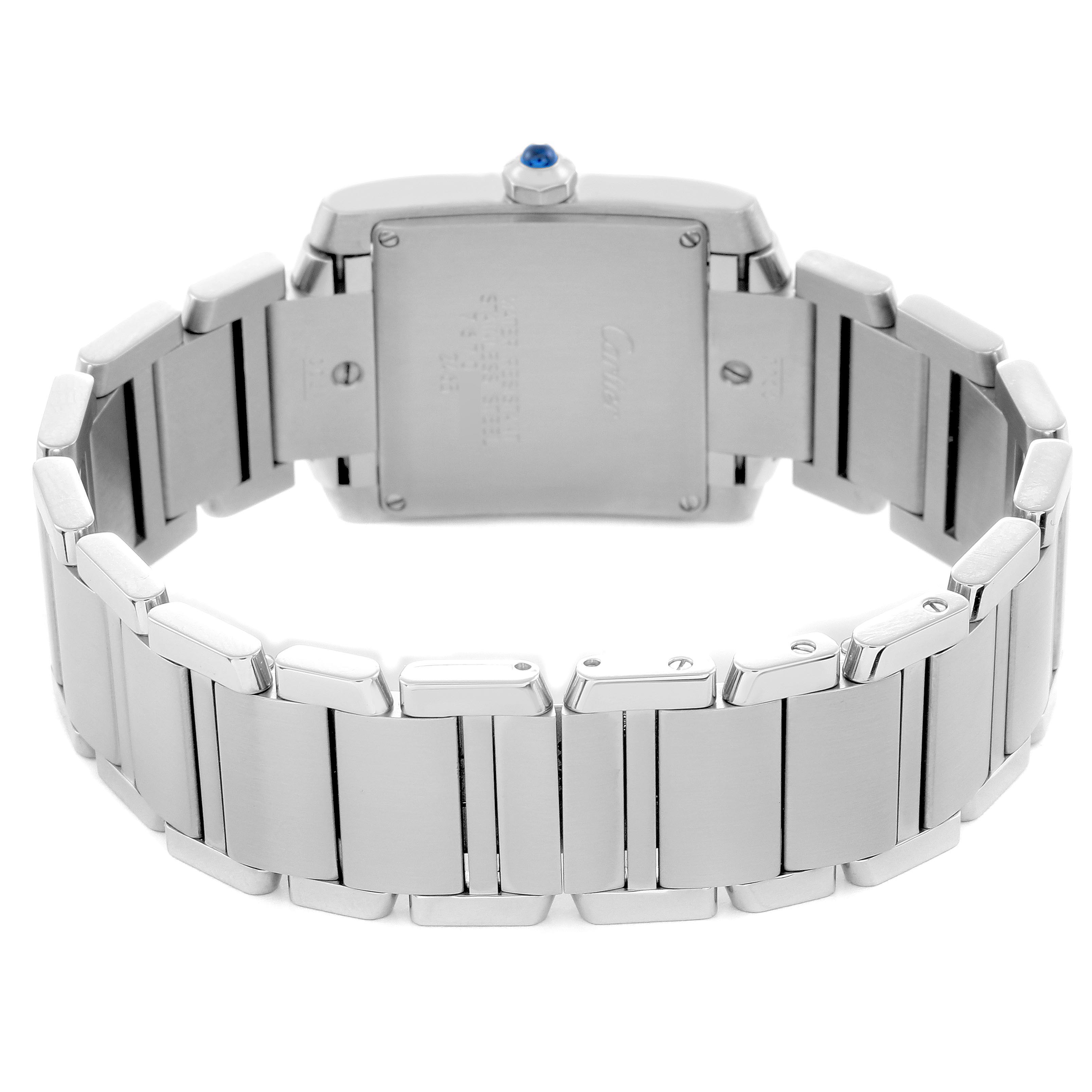 The Cartier Tank Française is shown from the back, highlighting the bracelet and caseback details.