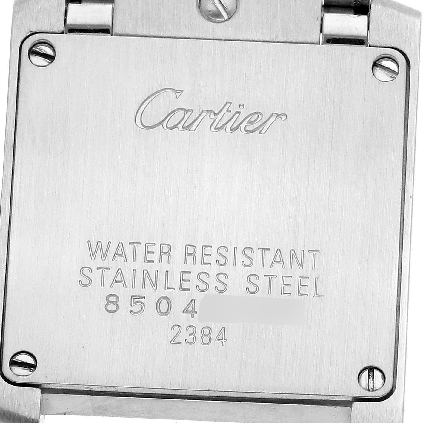 The image shows the back case of a Cartier Tank Française watch, highlighting its stainless steel material and water resistance markings.