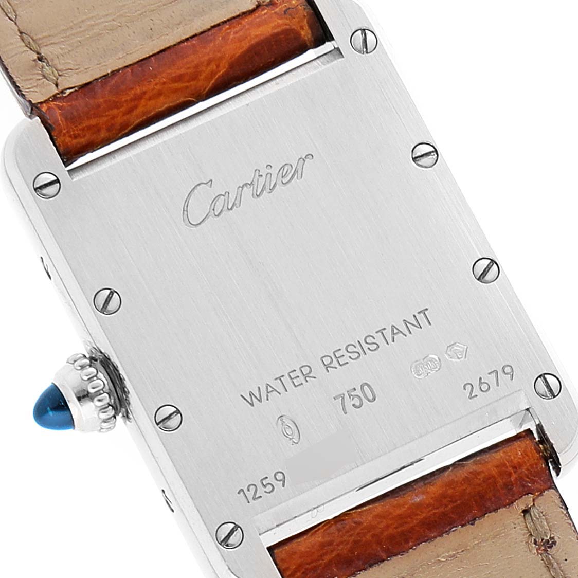 This is a back view of the Tank Louis model watch by Cartier, showing the case back, screws, and part of the leather strap.