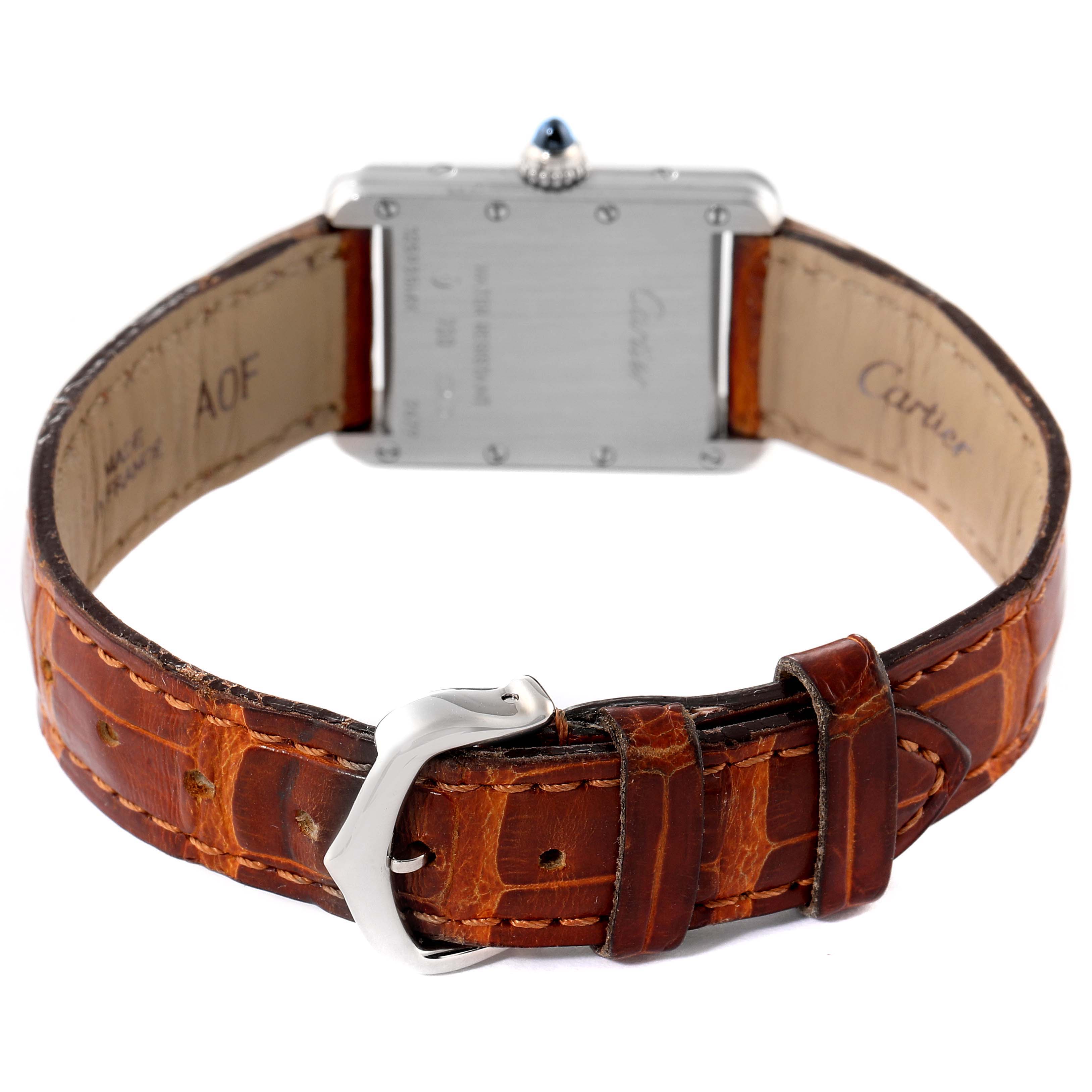 This image shows the back view of the Cartier Tank Louis W1541056 Women
s White Gold Silver Dial W1541056 Women
s White Gold Silver Dial watch, highlighting the leather strap and buckle.