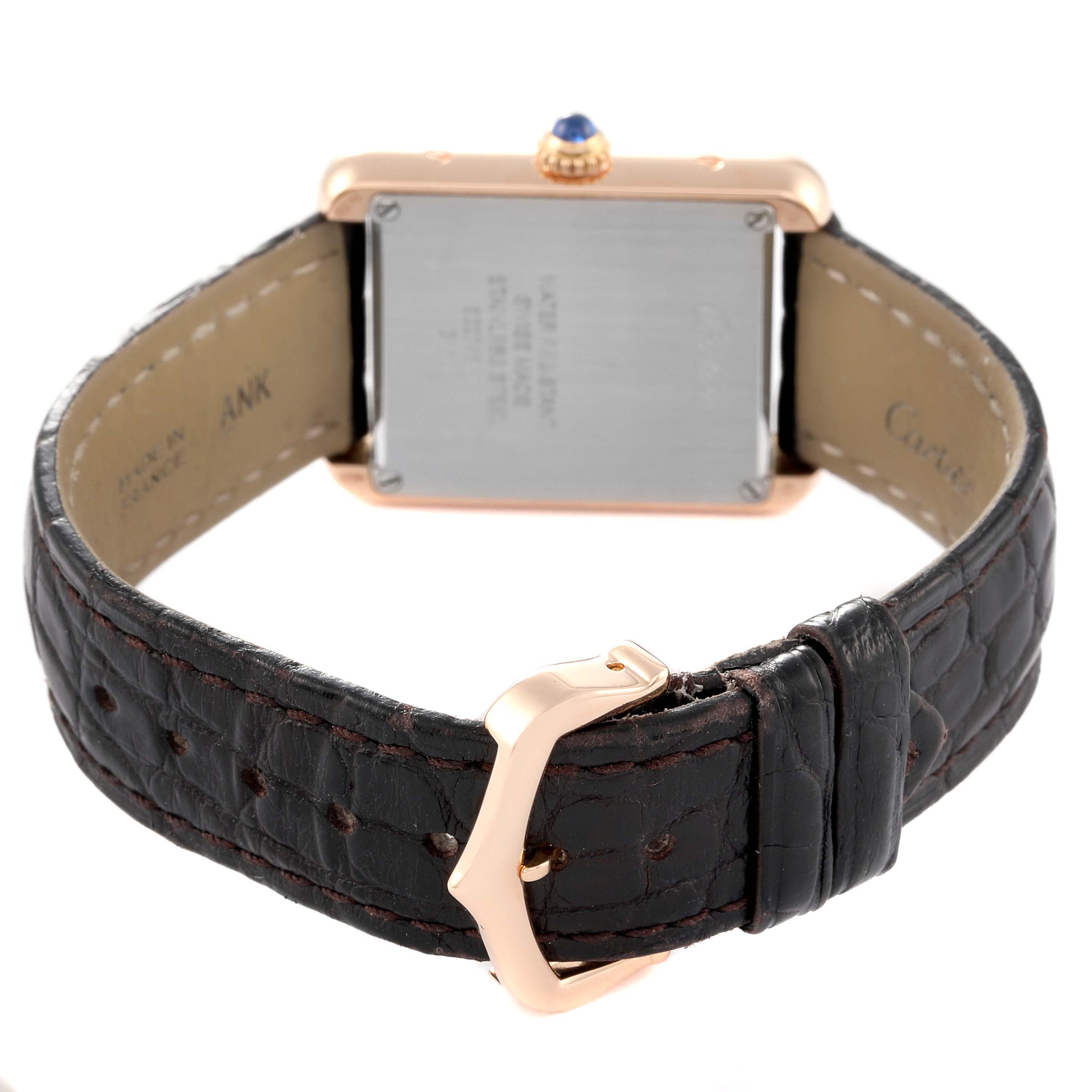 This image shows the back view of a Cartier Tank Solo W5200024 Women's Rose Gold Silver Dial W5200024 Women's Rose Gold Silver Dial watch, highlighting its leather strap and buckle.