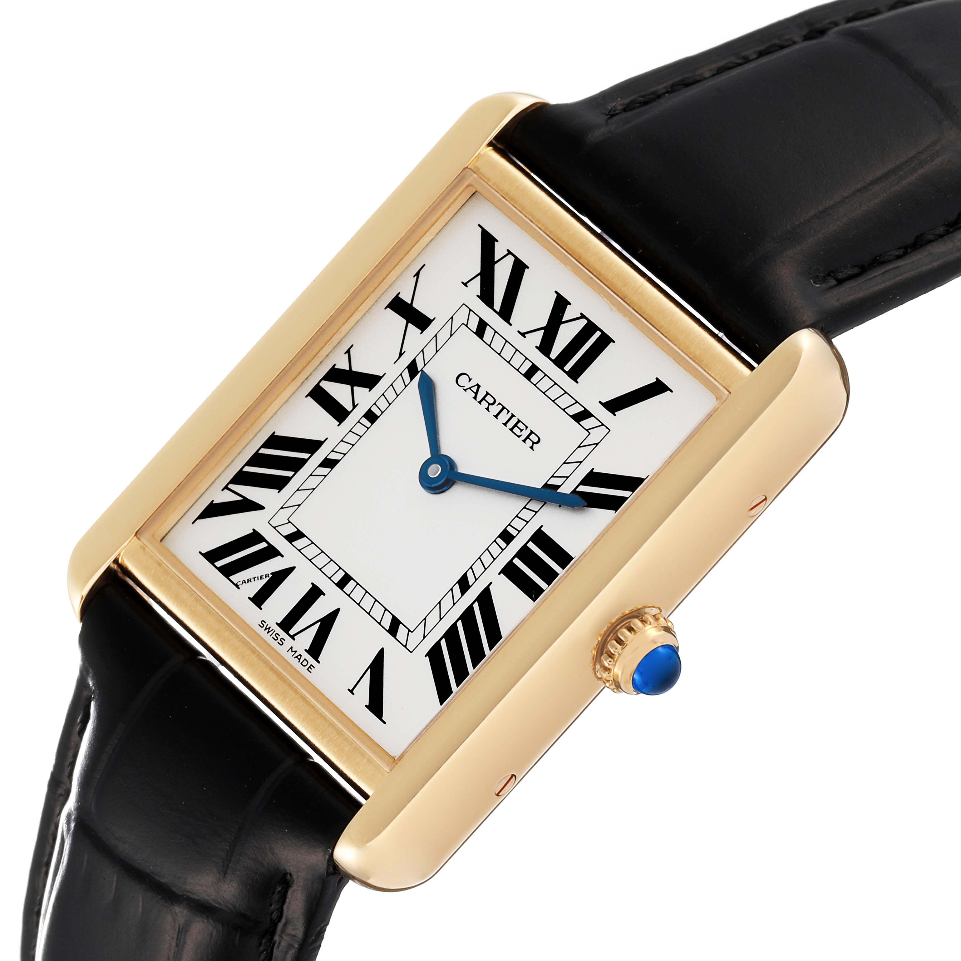 This image shows a Cartier Tank Solo W1018855 Men's Yellow Gold Silver Dial W1018855 Men's Yellow Gold Silver Dial watch at an angle displaying the face, crown, and a portion of the black leather strap.