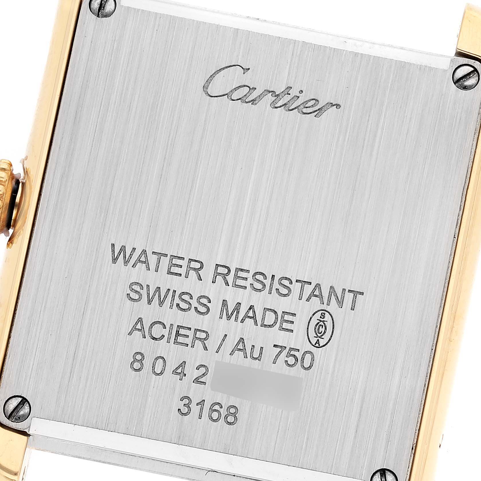 The image shows the back casing of a Cartier Tank Solo W5200002 Women's Yellow Gold Silver Dial W5200002 Women's Yellow Gold Silver Dial watch, highlighting its water resistance and Swiss manufacture details.