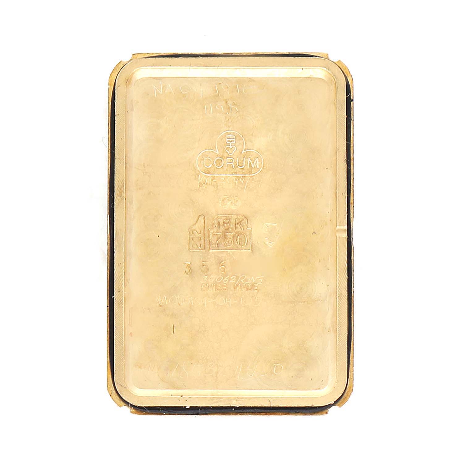 The image shows a close-up top view of the back case of the Corum Women's Yellow Gold Champagne Dial Women's Yellow Gold Champagne Dial 18K Yellow Gold 10 Gram Ingot 999.9 Ladies Watch.