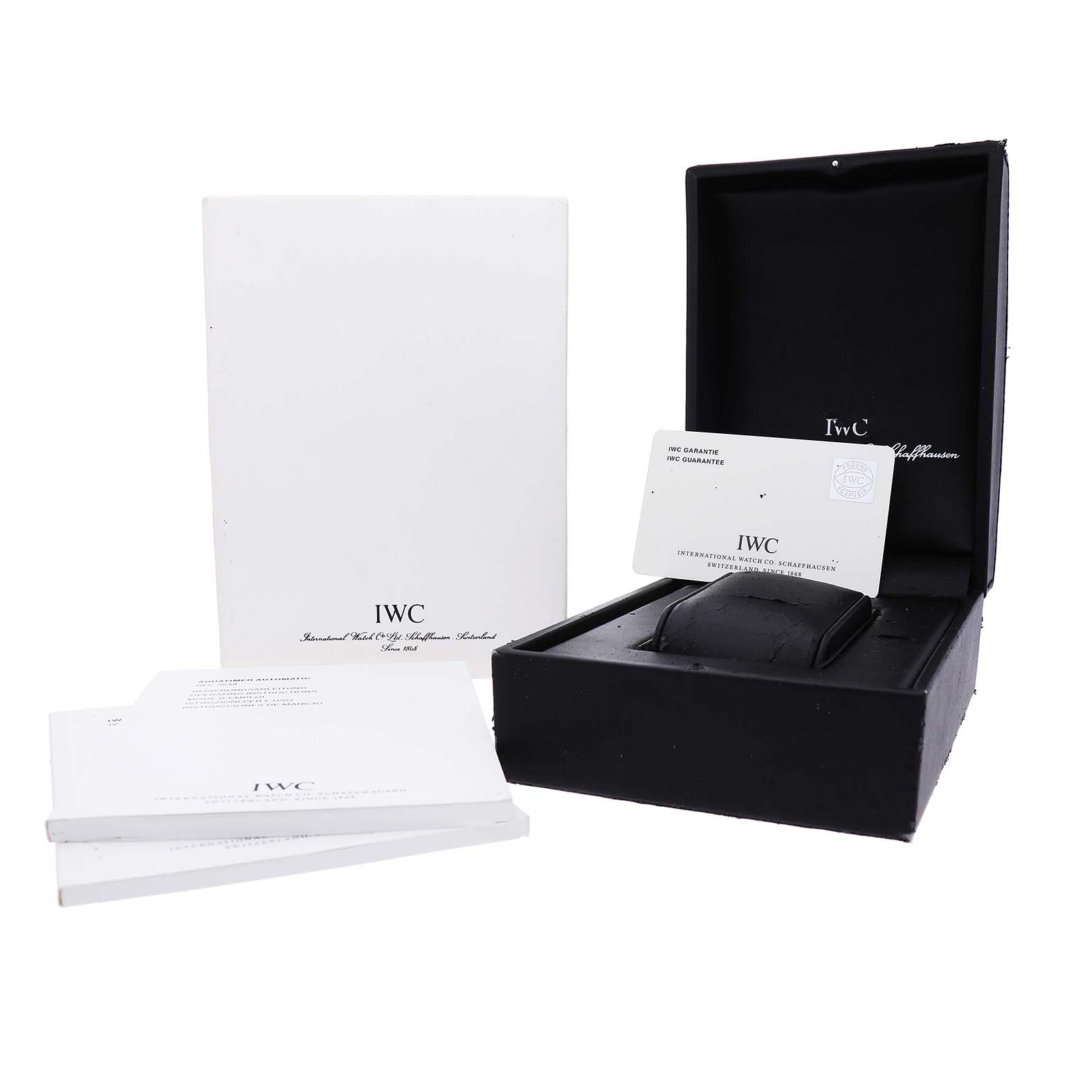 The image shows the IWC Aquatimer IW354805 Mens Stainless Steel Black Dial watch box, warranty card, user manuals, and packaging from a front angle.