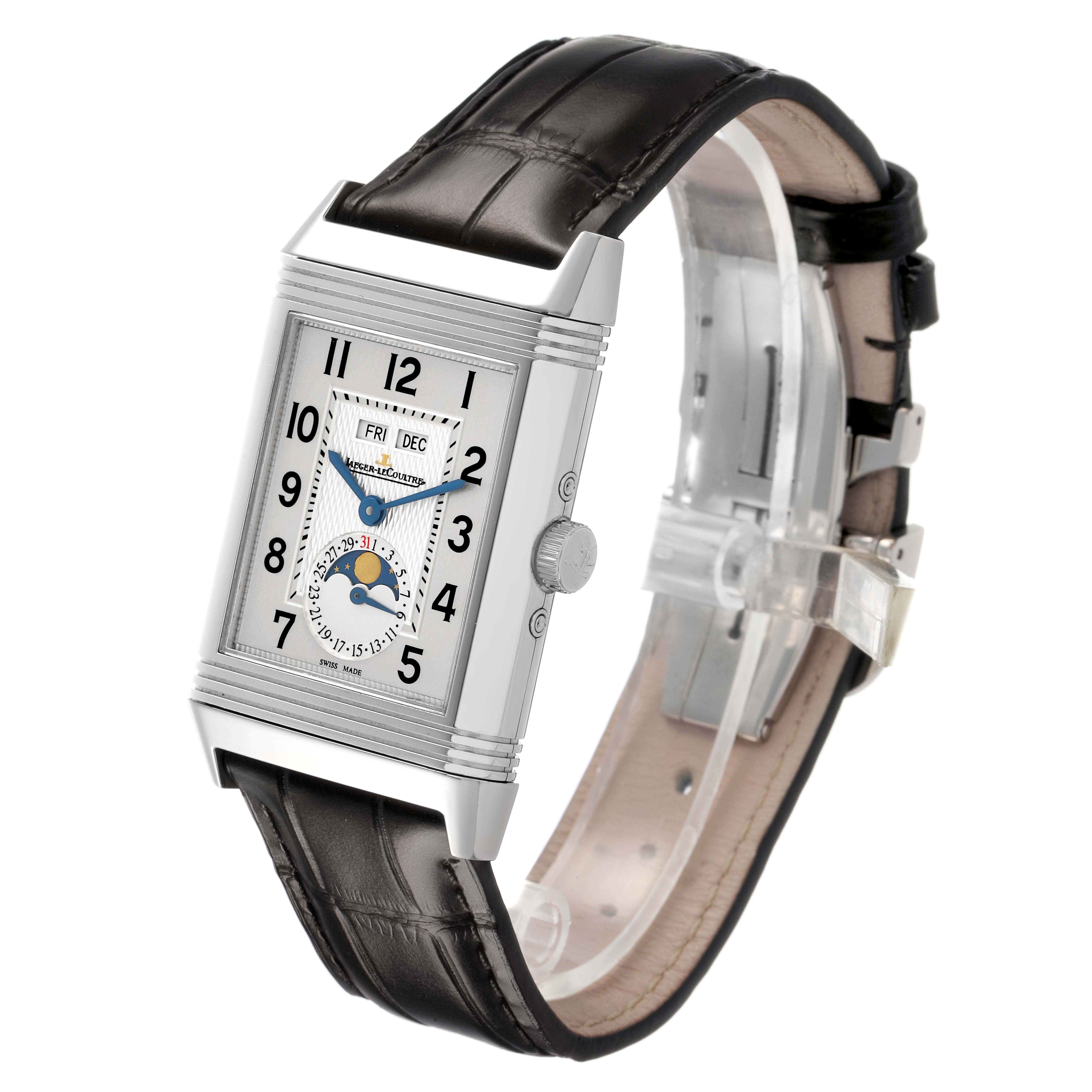 The Jaeger-LeCoultre Reverso watch is shown at a three-quarter angle, highlighting the dial, case, and leather strap.