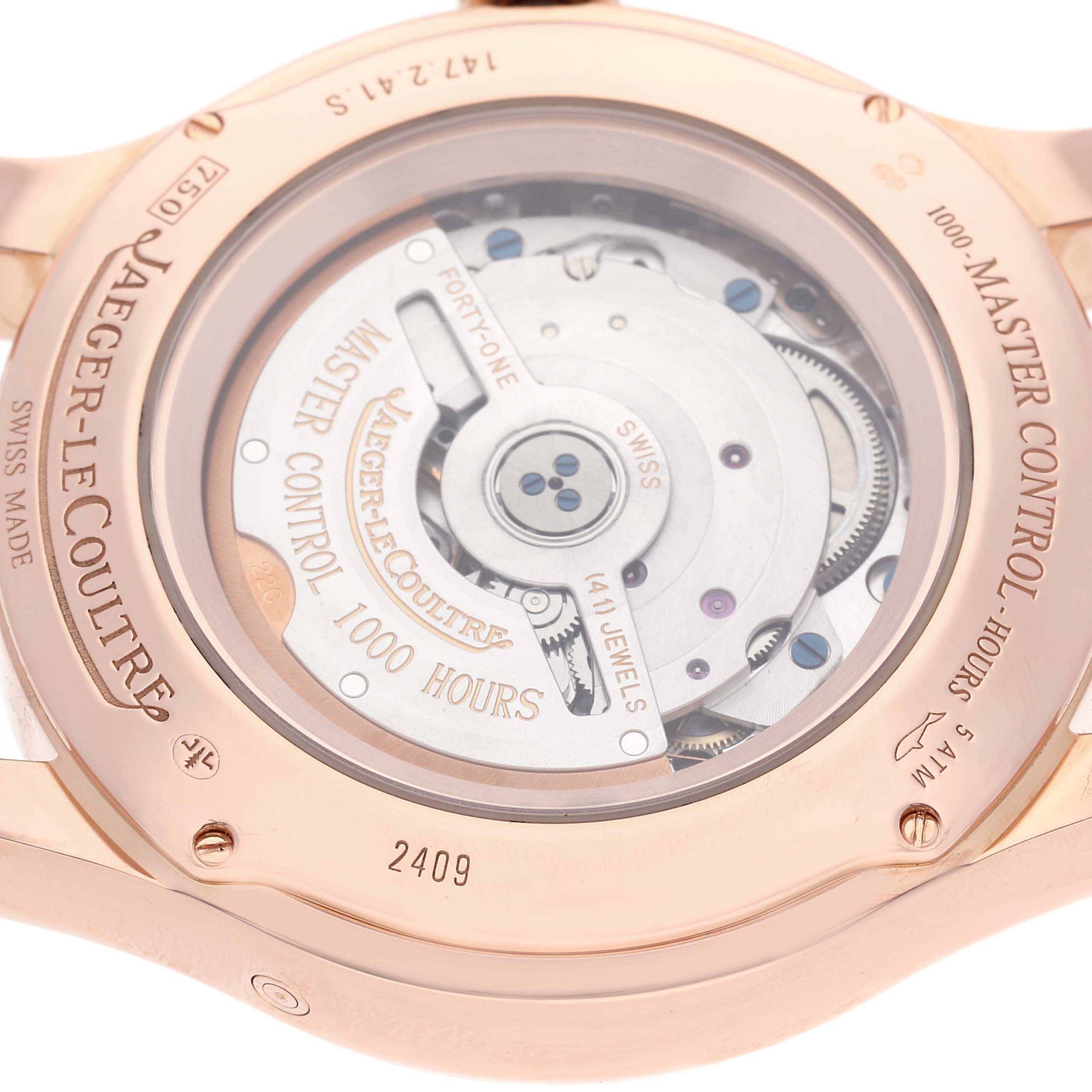 The image shows the back view of the Jaeger-LeCoultre Master Control watch, highlighting its automatic movement and engravings.