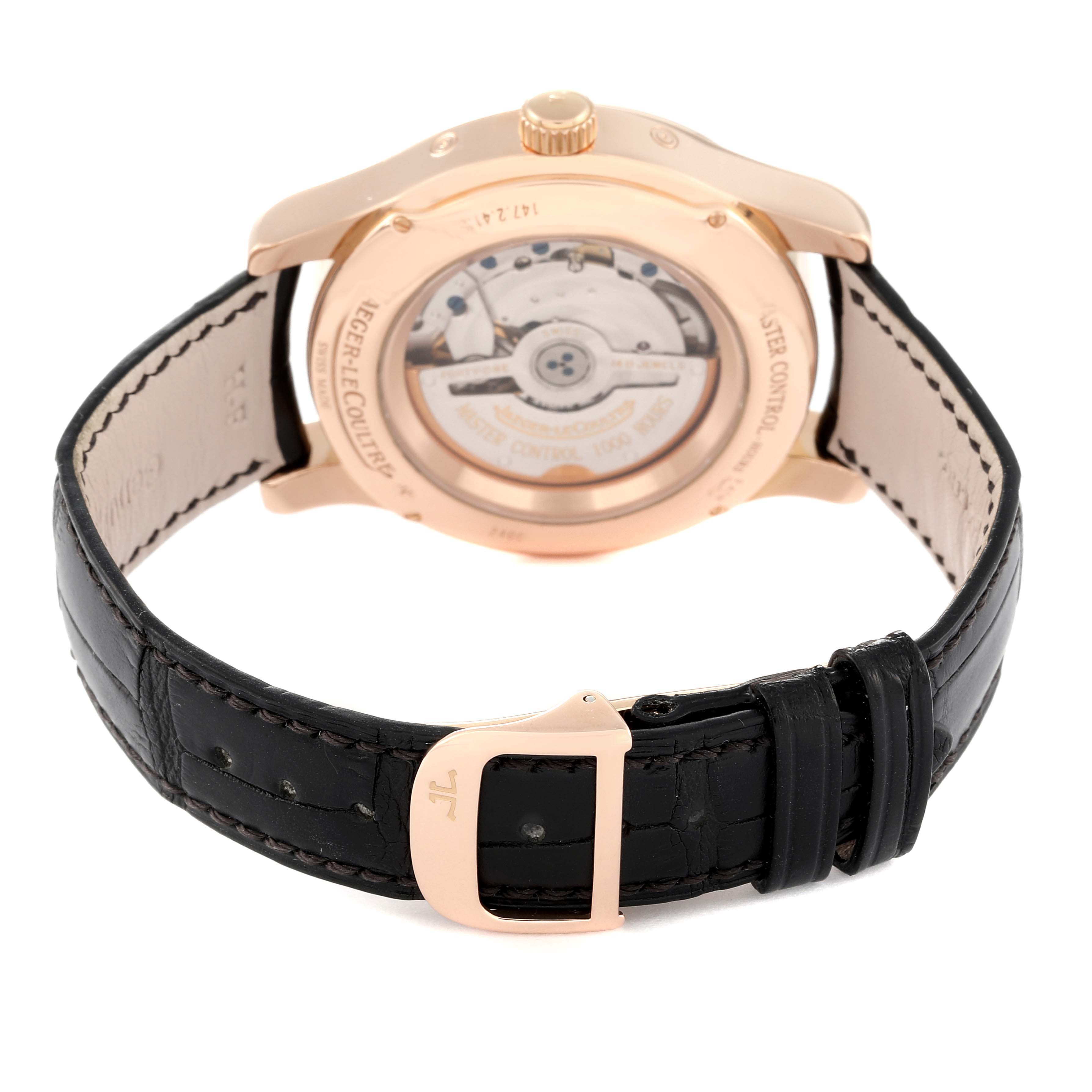 The image shows the back view of a Jaeger LeCoultre Master Q1512Y2A Men
s Rose Gold Silver Dial Q1512Y2A Men
s Rose Gold Silver Dial model watch with a black leather strap and visible movement.