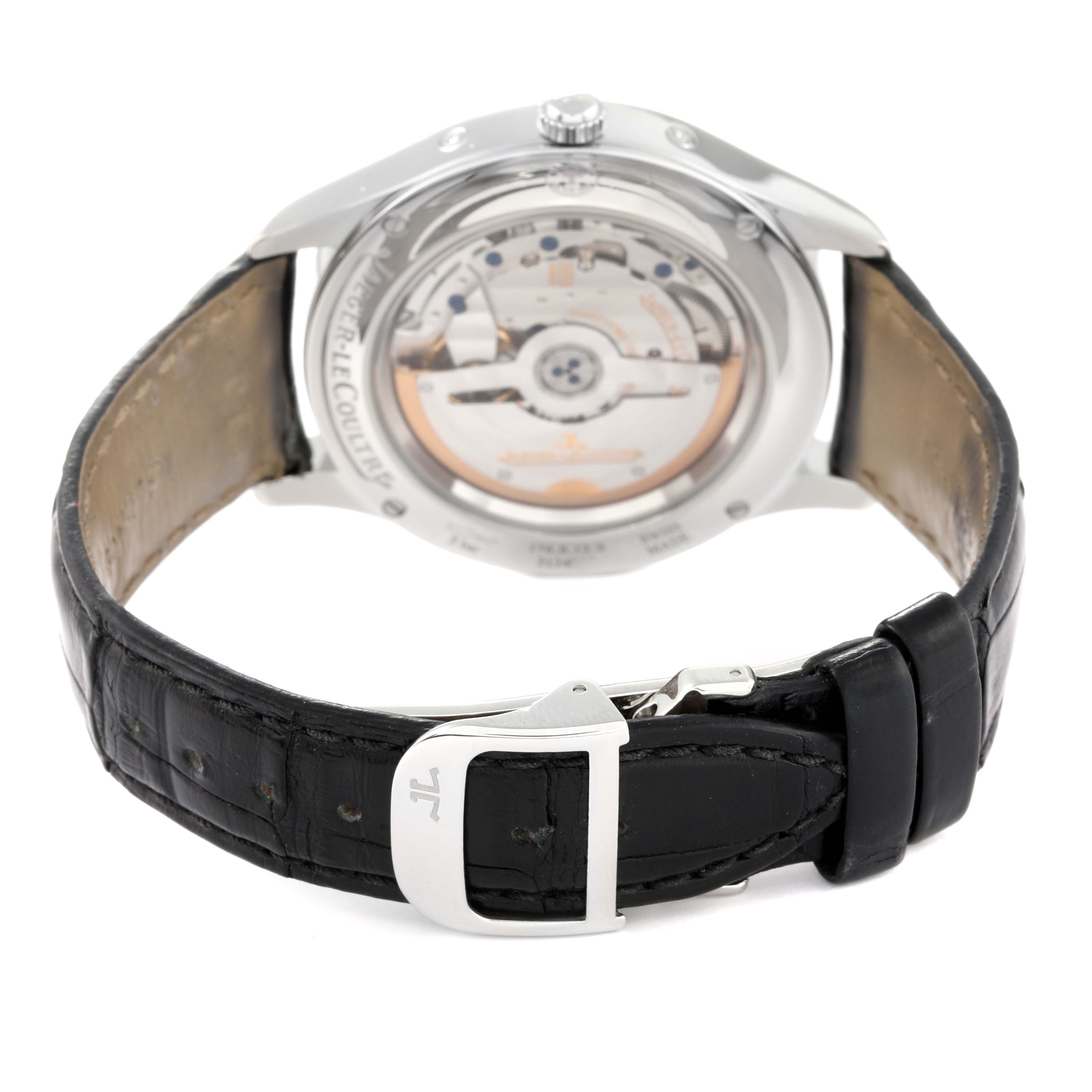 The image shows the back of the Jaeger-LeCoultre Master watch, highlighting the movement and the black leather strap with the clasp.